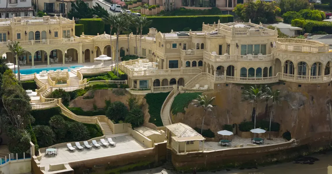 A late tech billionaire’s Versailles-inspired California mansion just took a $20 million price cut to $87.5 million. See inside.