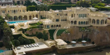 A late tech billionaire’s Versailles-inspired California mansion just took a $20 million price cut to $87.5 million. See inside.