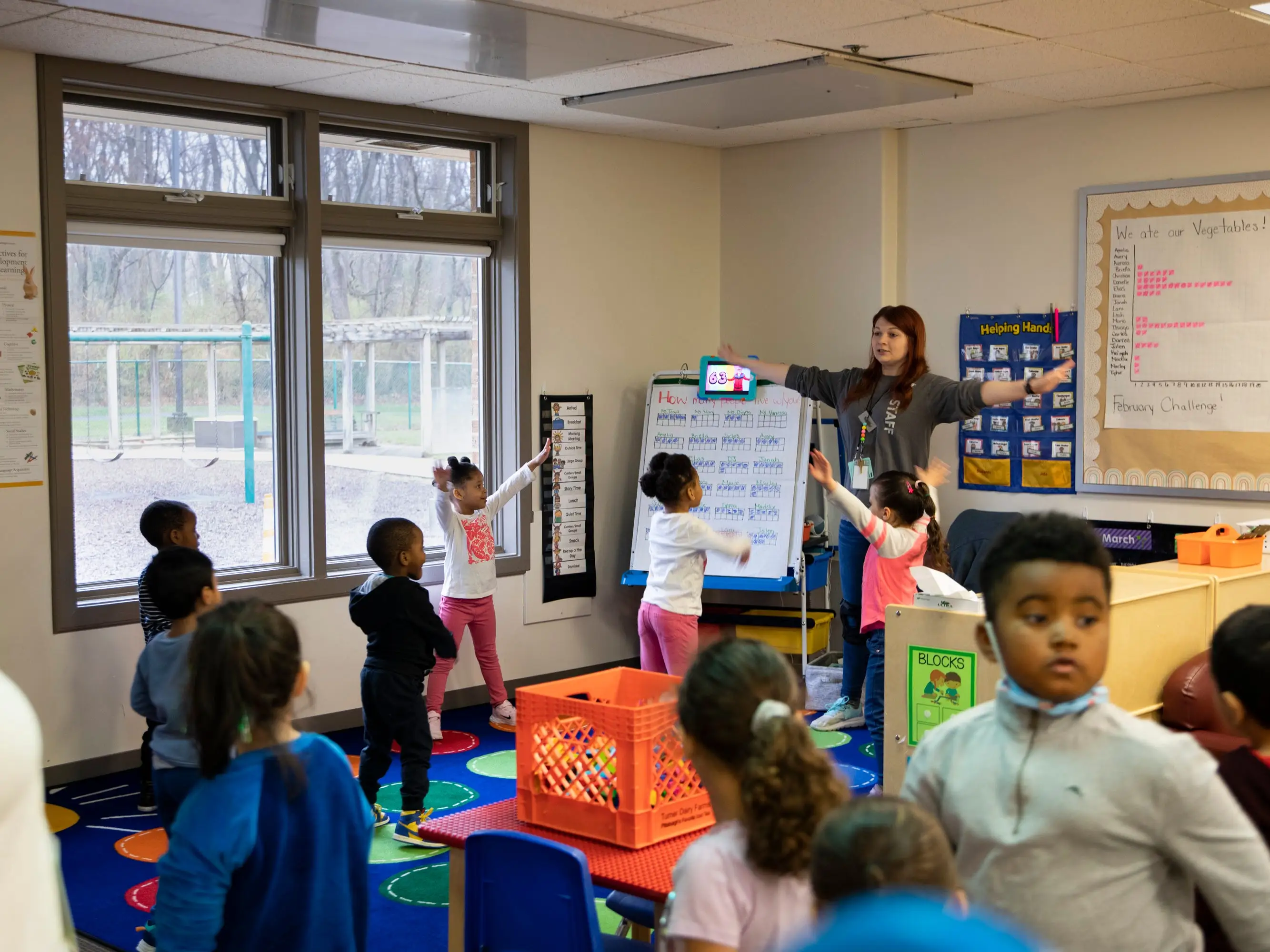 Teacher leading students in head start classroom in Frederick, Maryland.