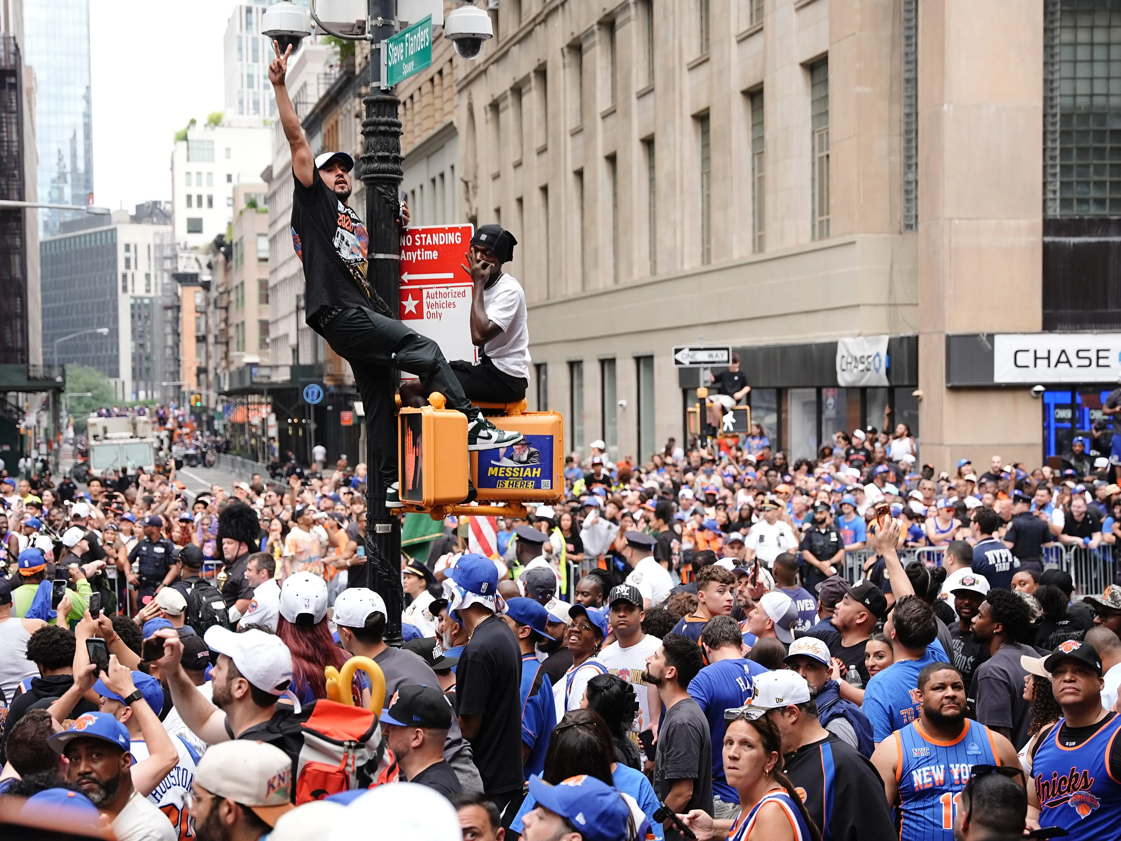 Fans line the street during the New York Knicks Championship ticker tape parade and victory rally celebrating winning the 2026 NBA Finals on June 18, 2026 in New York City. The New York Knicks defeated the San Antonio Spurs in five games to win their first NBA Championship in 53 years. (