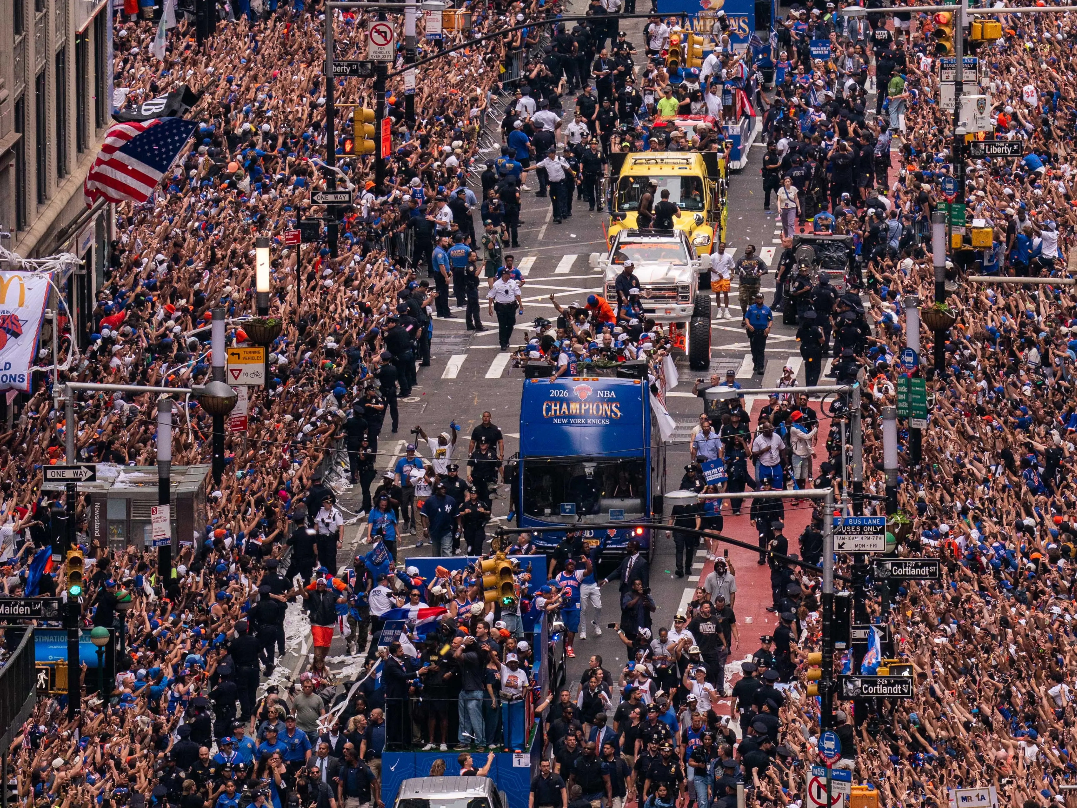 Thousands of fans gather on Broadway in lower Manhattan for the New York Knicks Championship ticker-tape parade on June 18, 2026 in New York City.