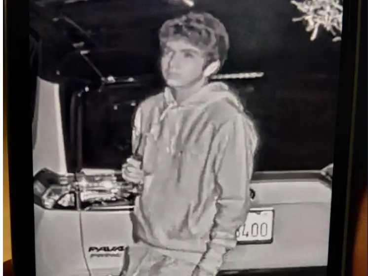 A black and white image of a the man who alleged attacked Sam Altman's home