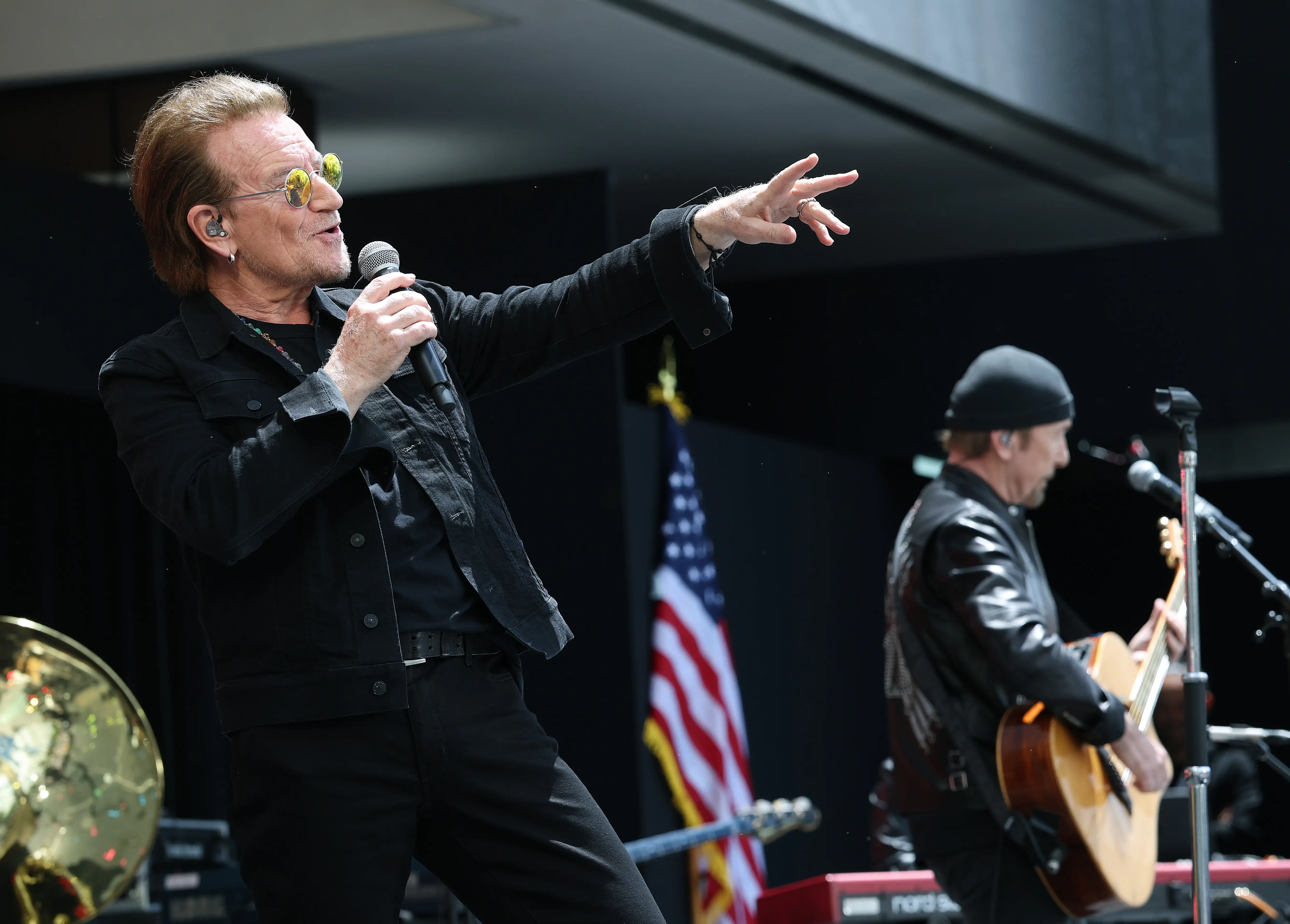 Bono (L) and The Edge of U2 perform during the dedication ceremony for the opening of the Barack Obama Presidential Center.