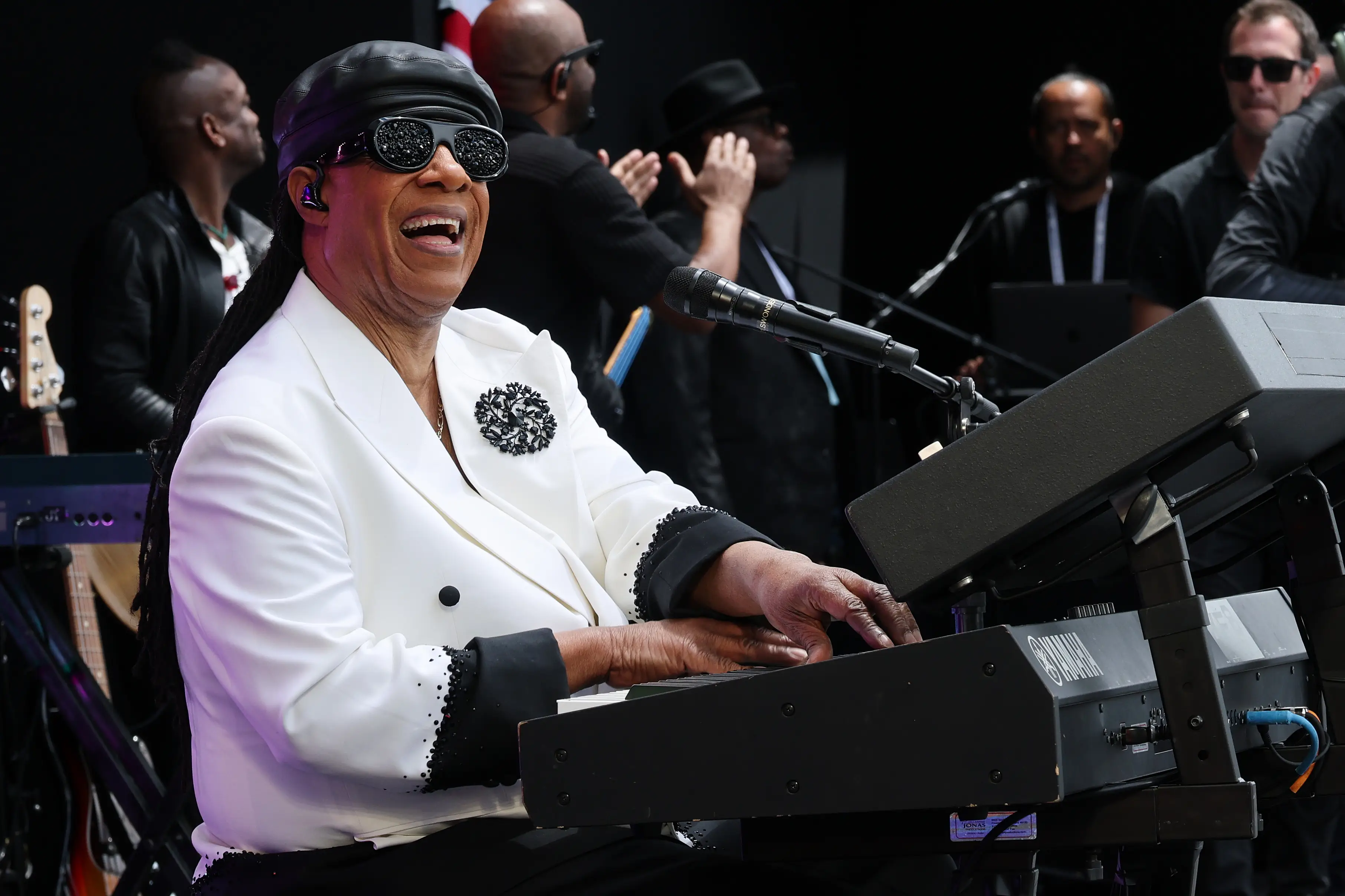 Stevie Wonder performs during the dedication ceremony for the opening of the Barack Obama Presidential Center