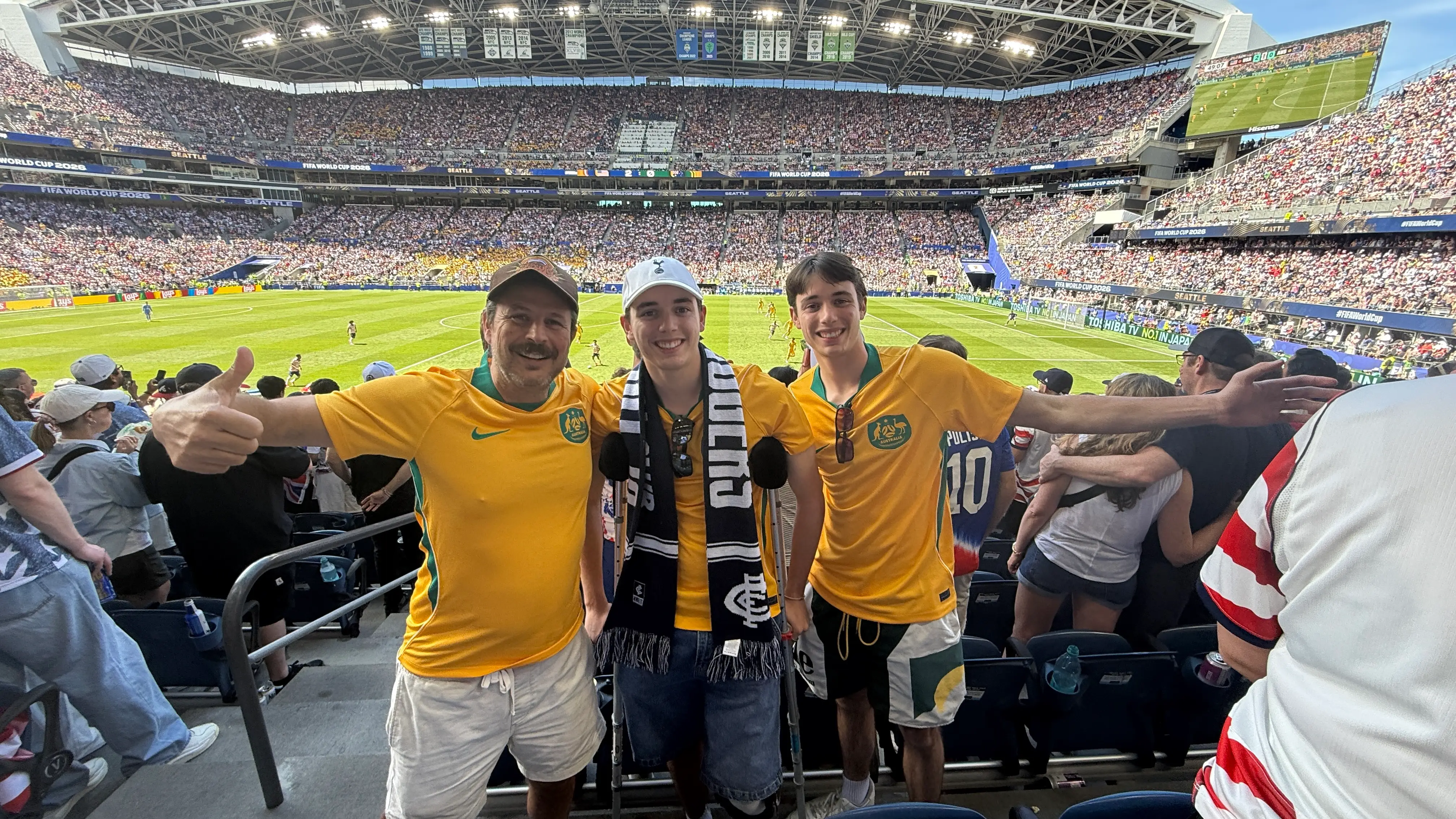 The author with his twin sons at a World Cup Match in Seattle.