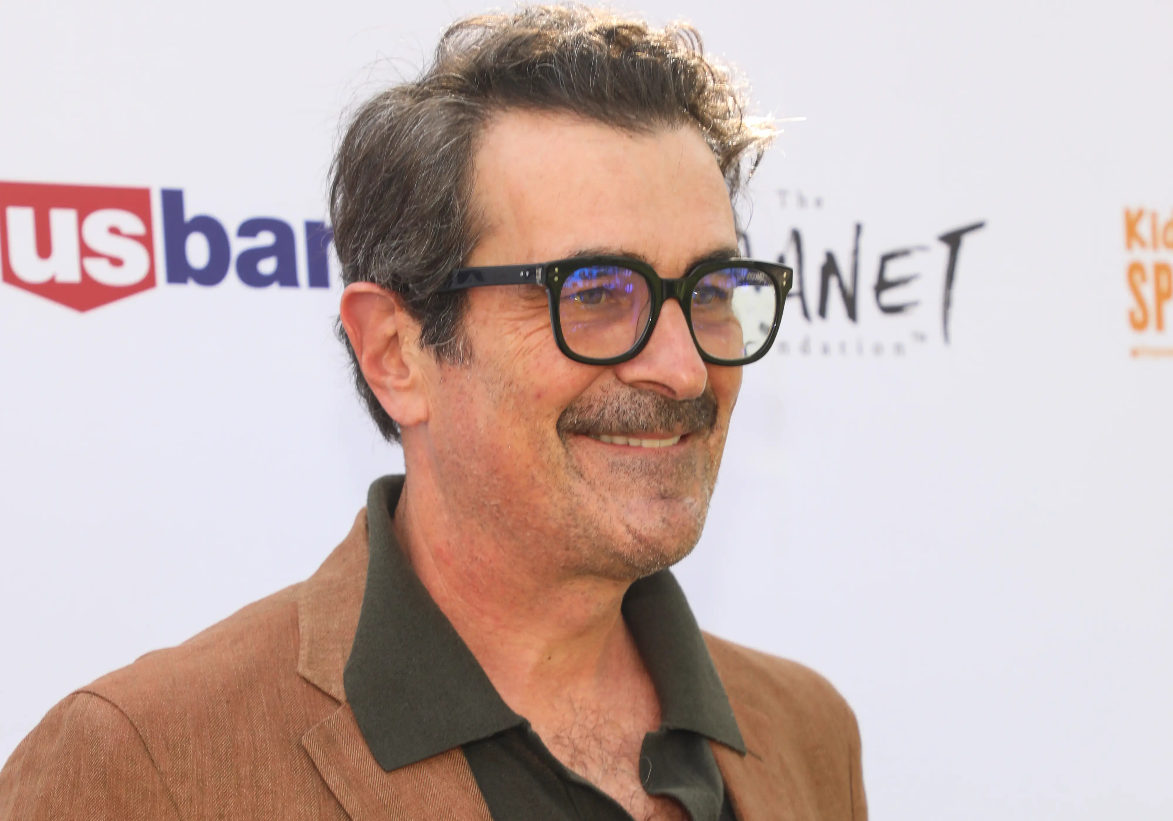 Ty Burrell on a red carpet.