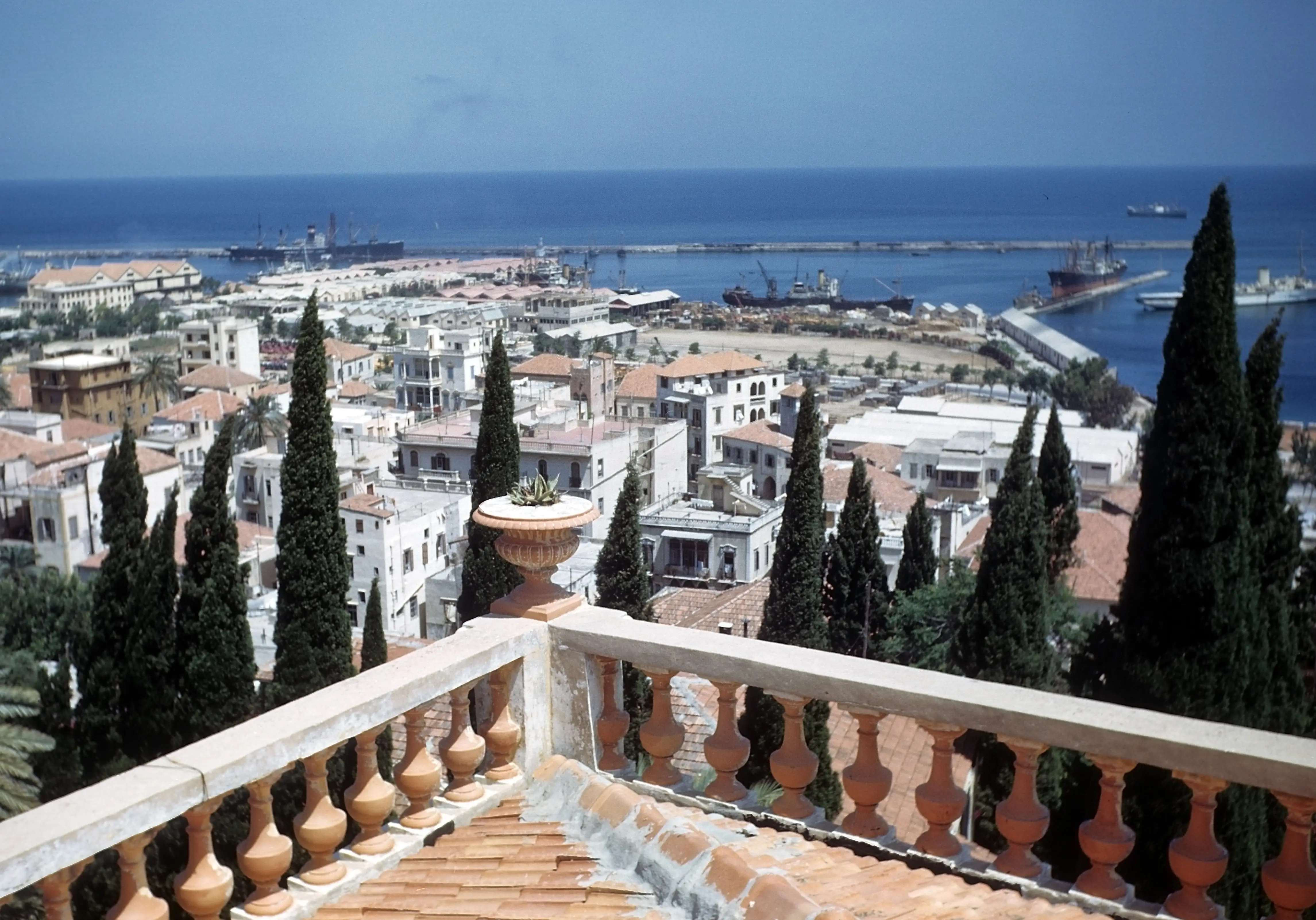 BEIRUT, LEBANON - MAY 1948: An aerial view from a rooftop, of buildings and the harbor in Beirut, Lebanon.