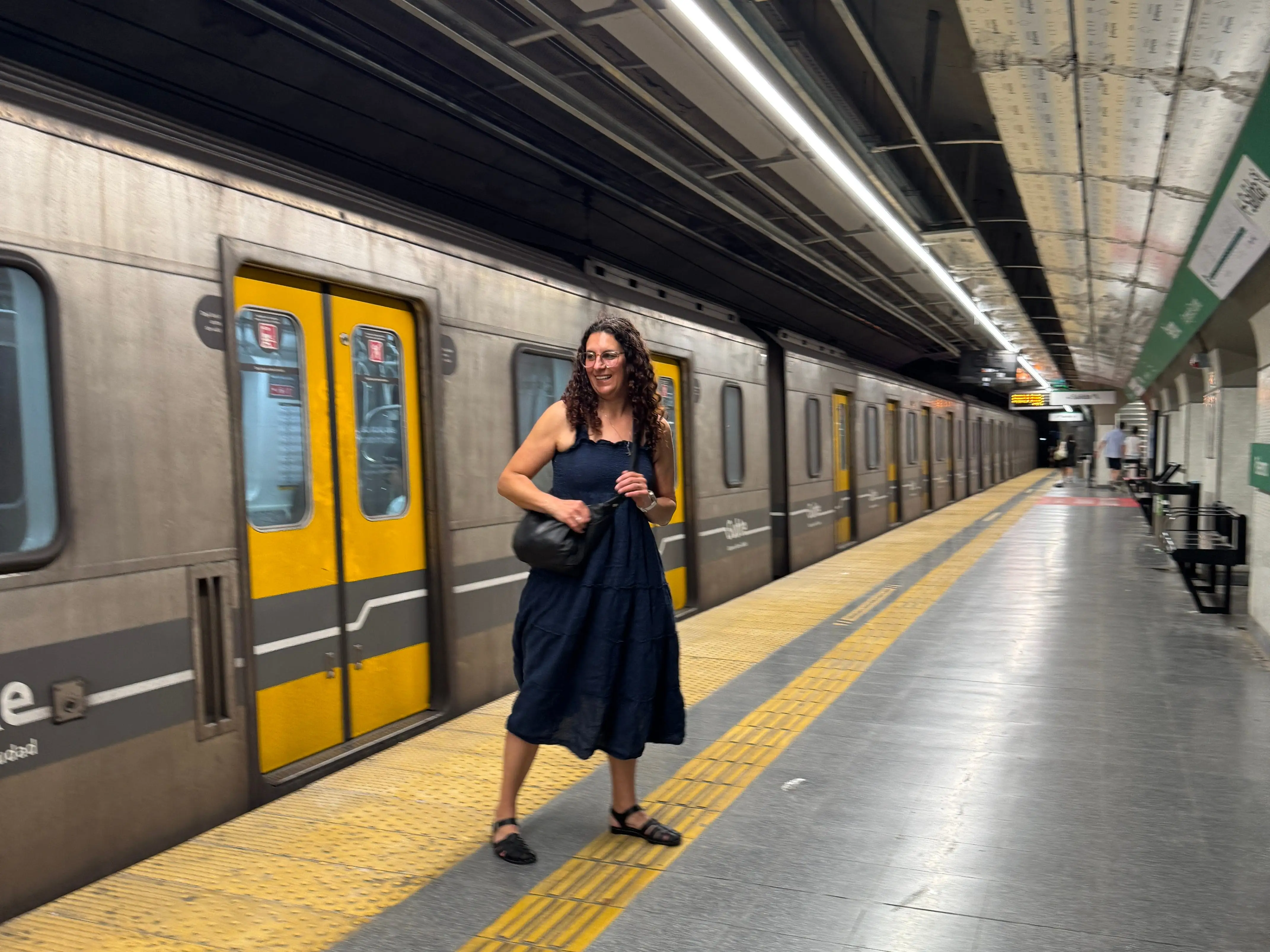 Woman standing near a train in Buenos Aires