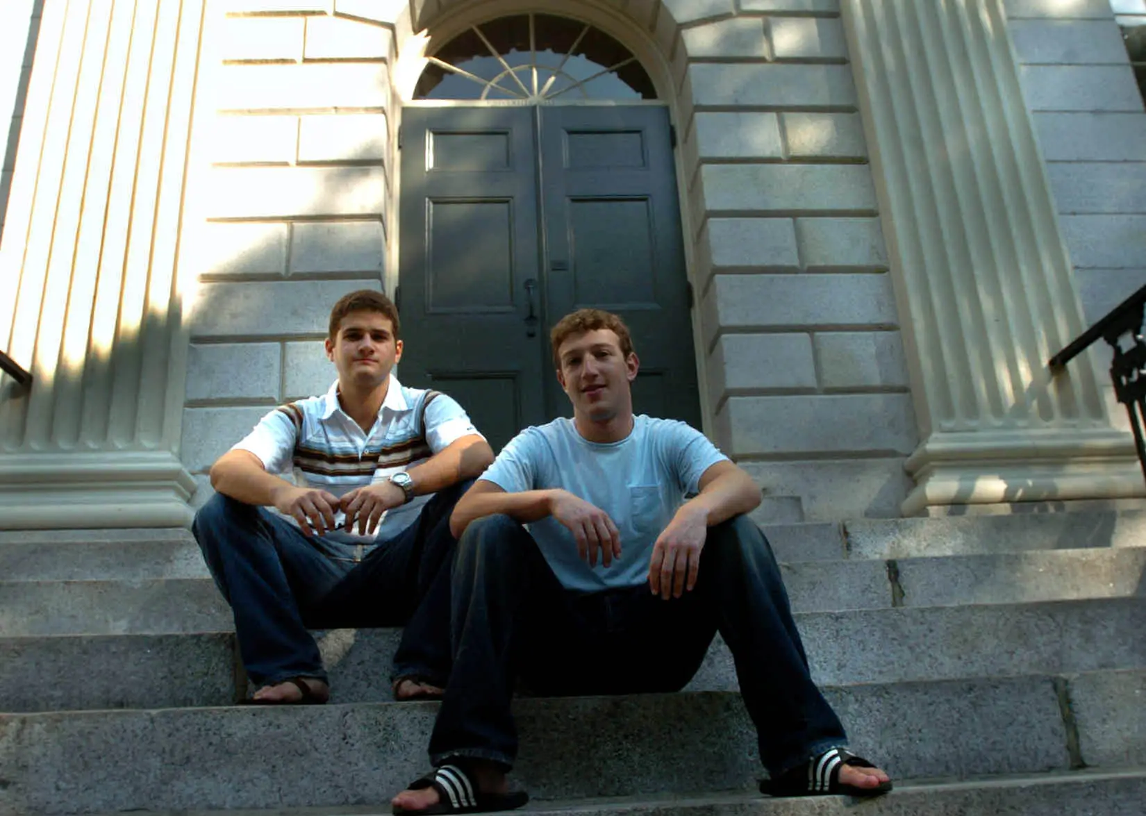 Founder of Facebook.com Mark Zuckerberg, right, and Dustin Moscovitz, co-founder, left; have their photo taken at Harvard Yard. The two are students at Harvard University who are taking the semester off. (Photo by Justine Hunt/The Boston Globe via Getty Images)