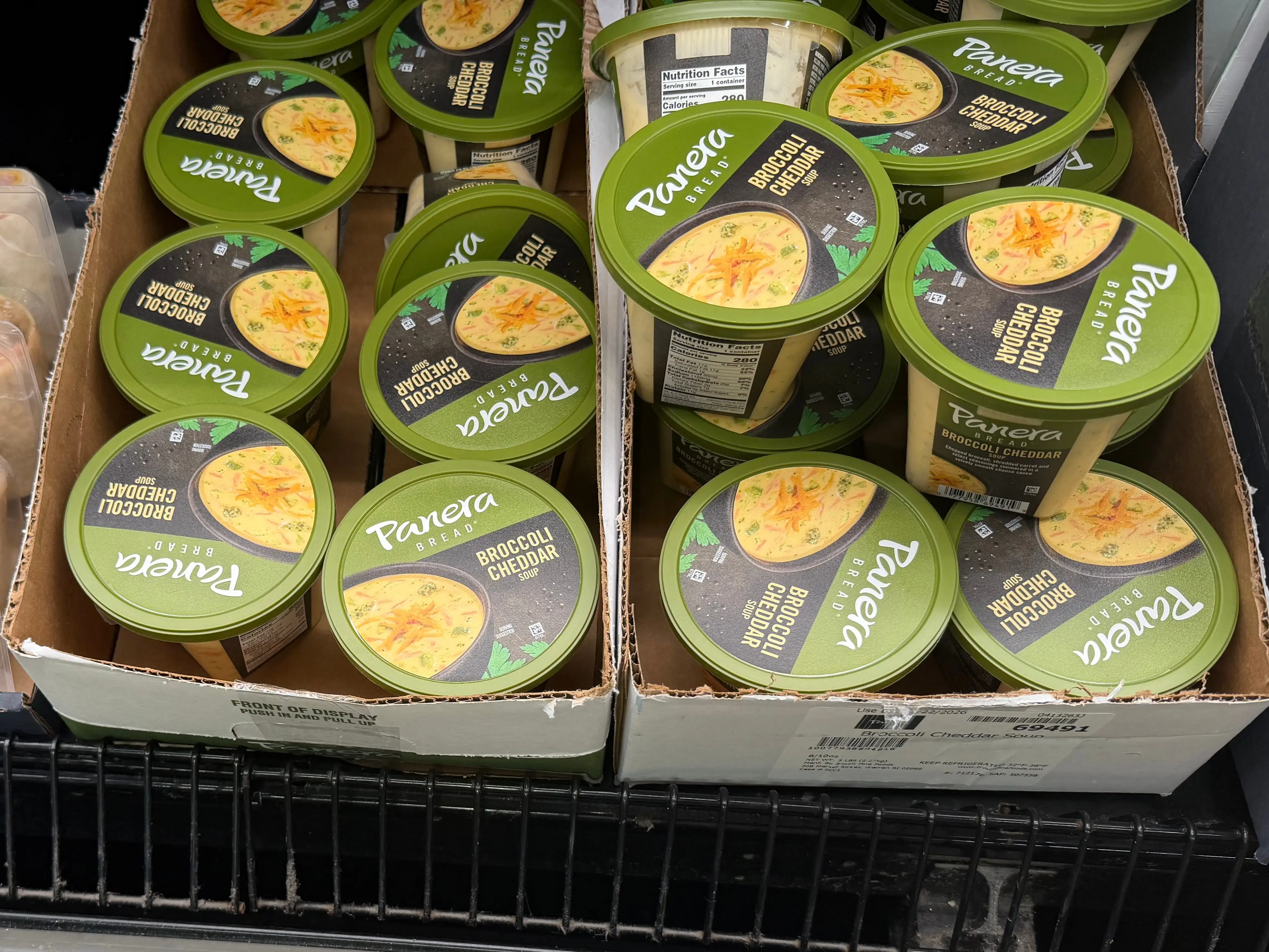 Containers of Panera Bread broccoli cheddar soup at Aldi.