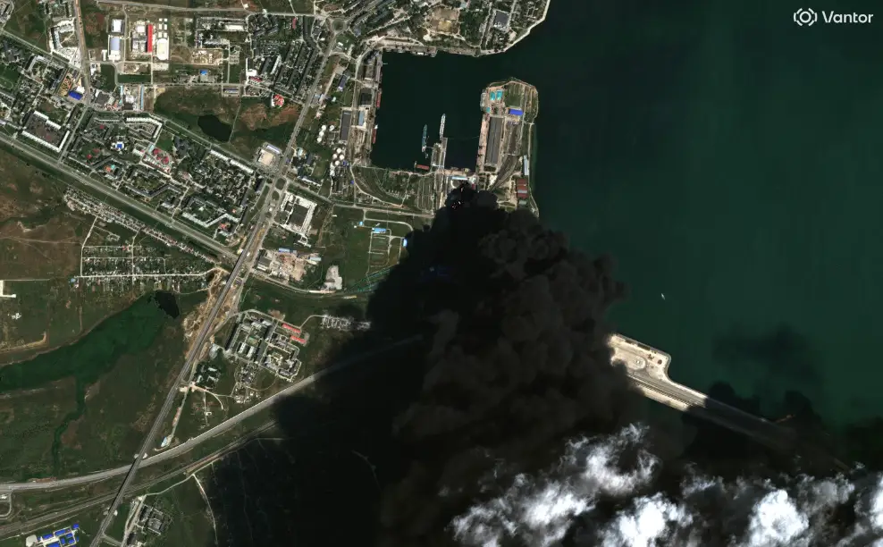 Smoke billows up in Kerch after an attack on a Russian oil facility.