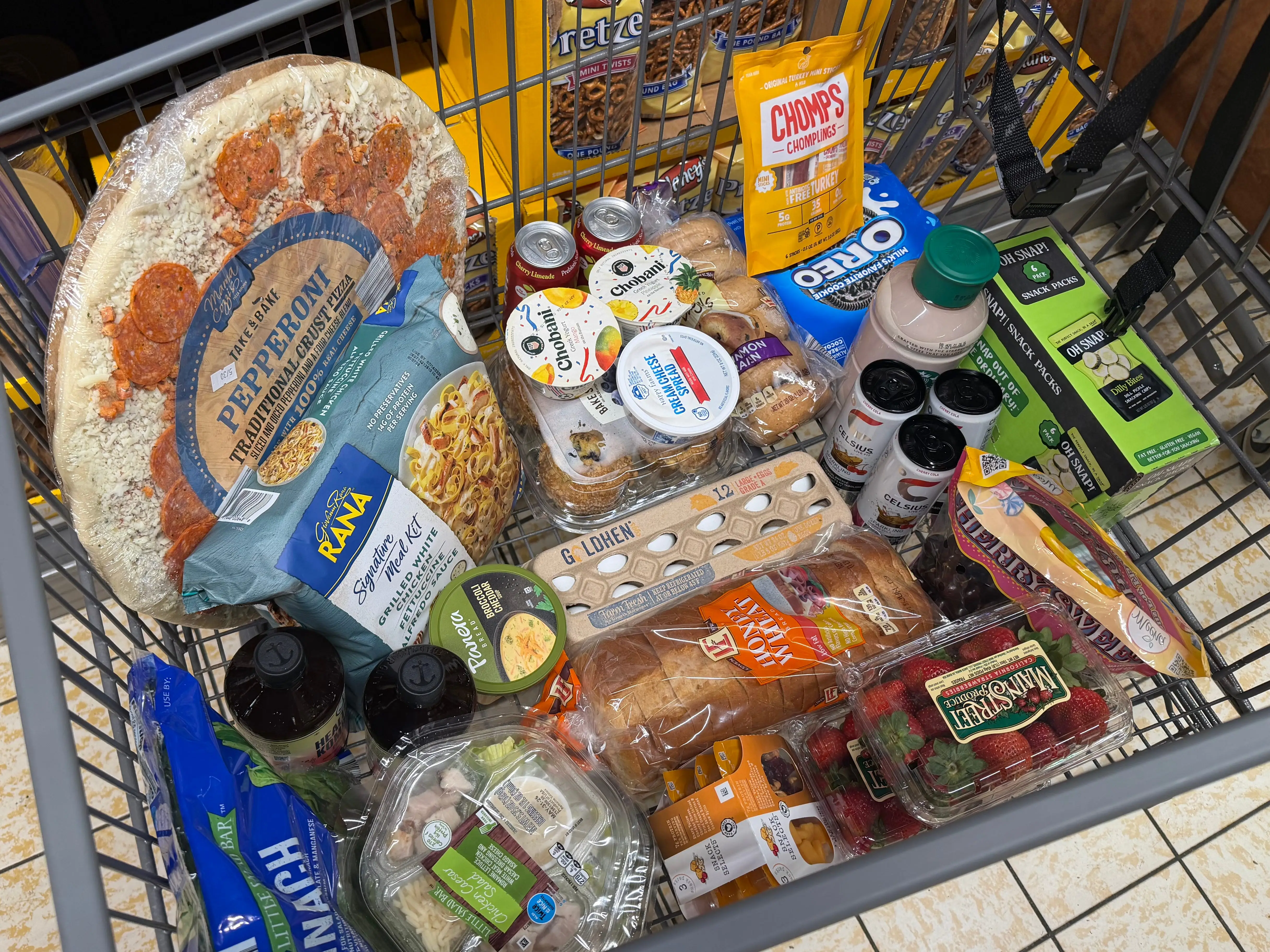 A cart full of groceries from Aldi.