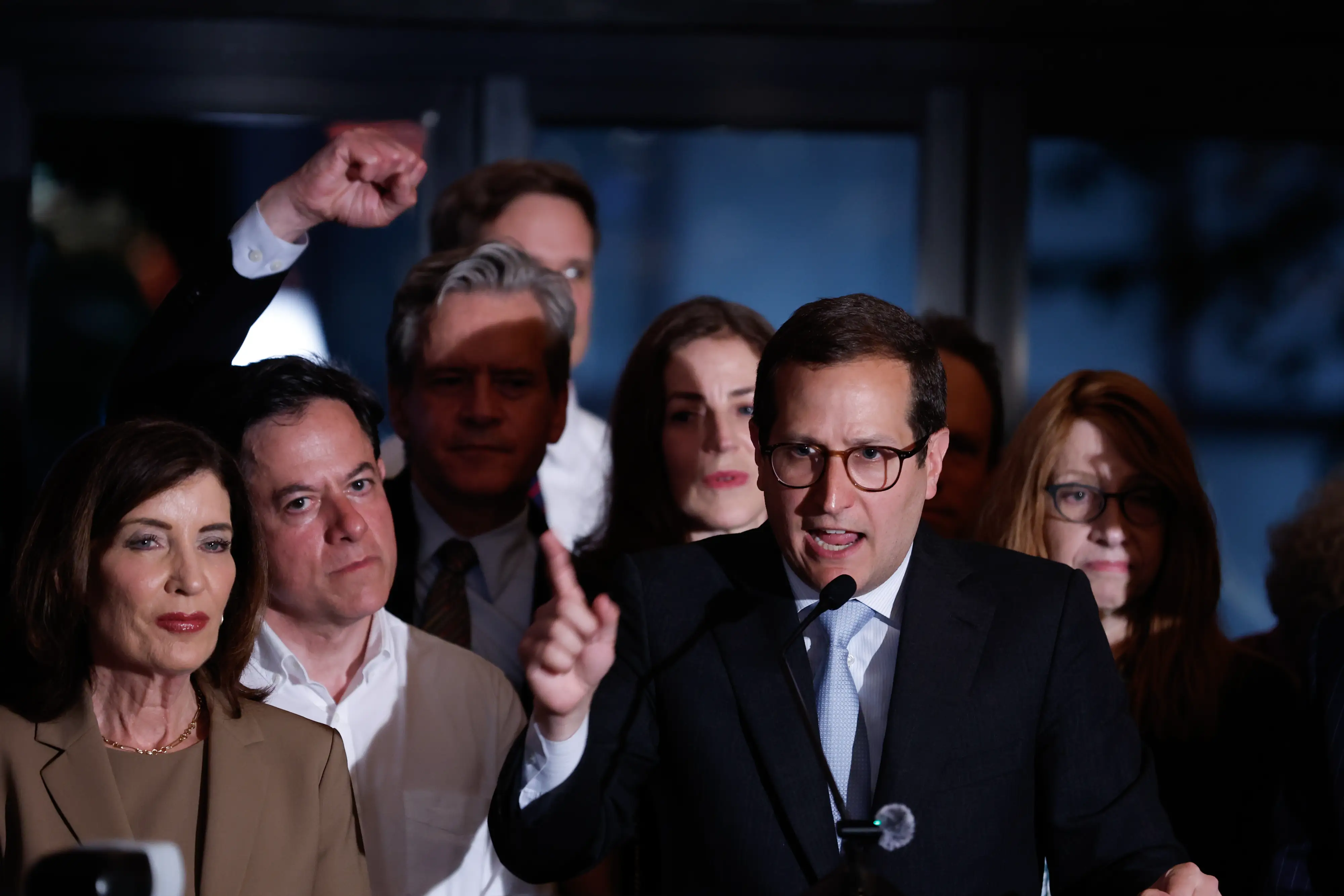 State Representative Micah Lasher, a Democrat from New York and US House candidate, takes photos with attendees during a primary election night watch party in New York, US, on Tuesday, June 23, 2026. Two candidates backed by Zohran Mamdani were on course to win Democratic congressional primaries on Tuesday, a sign that the