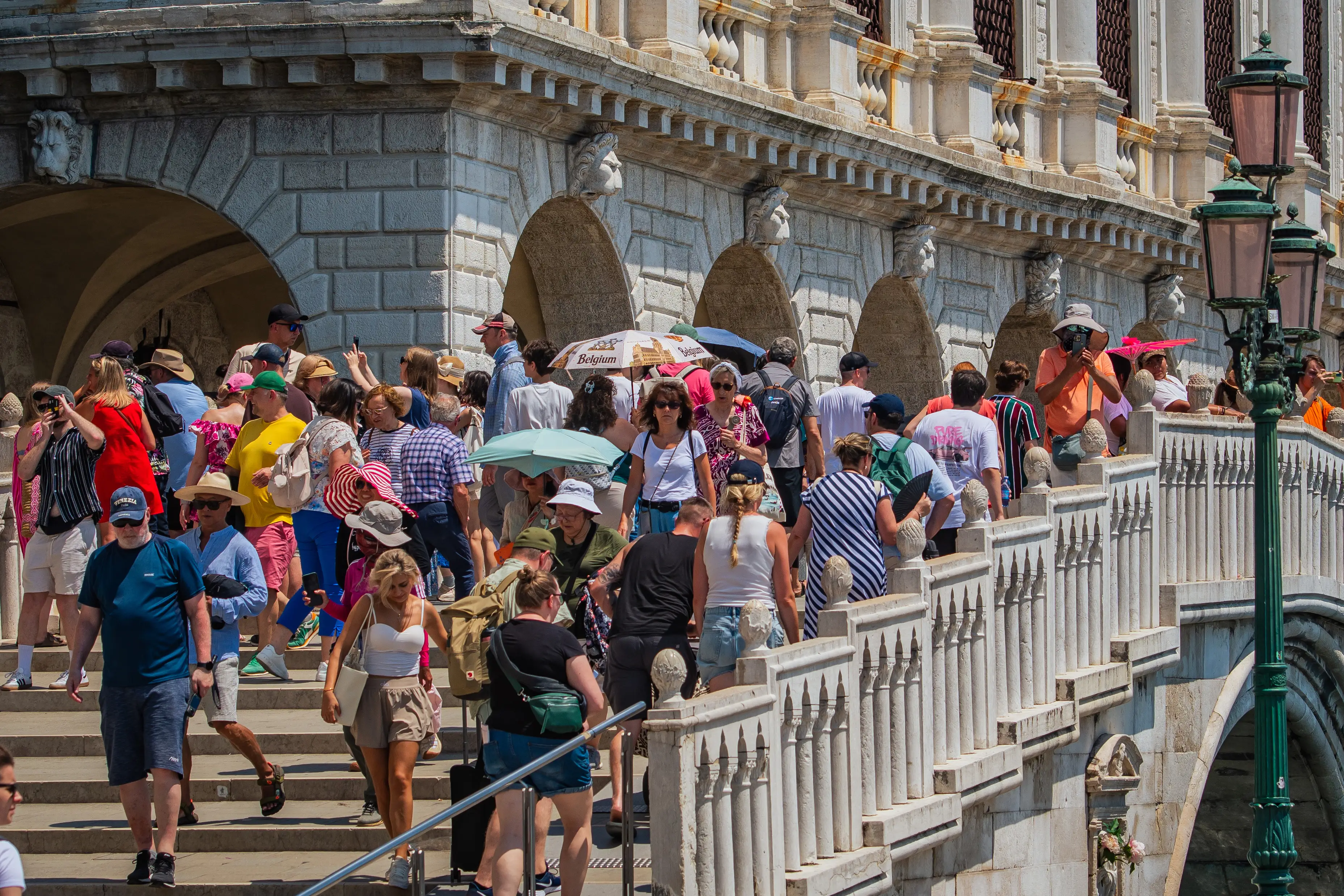 Tourists in the sun in Venice.
