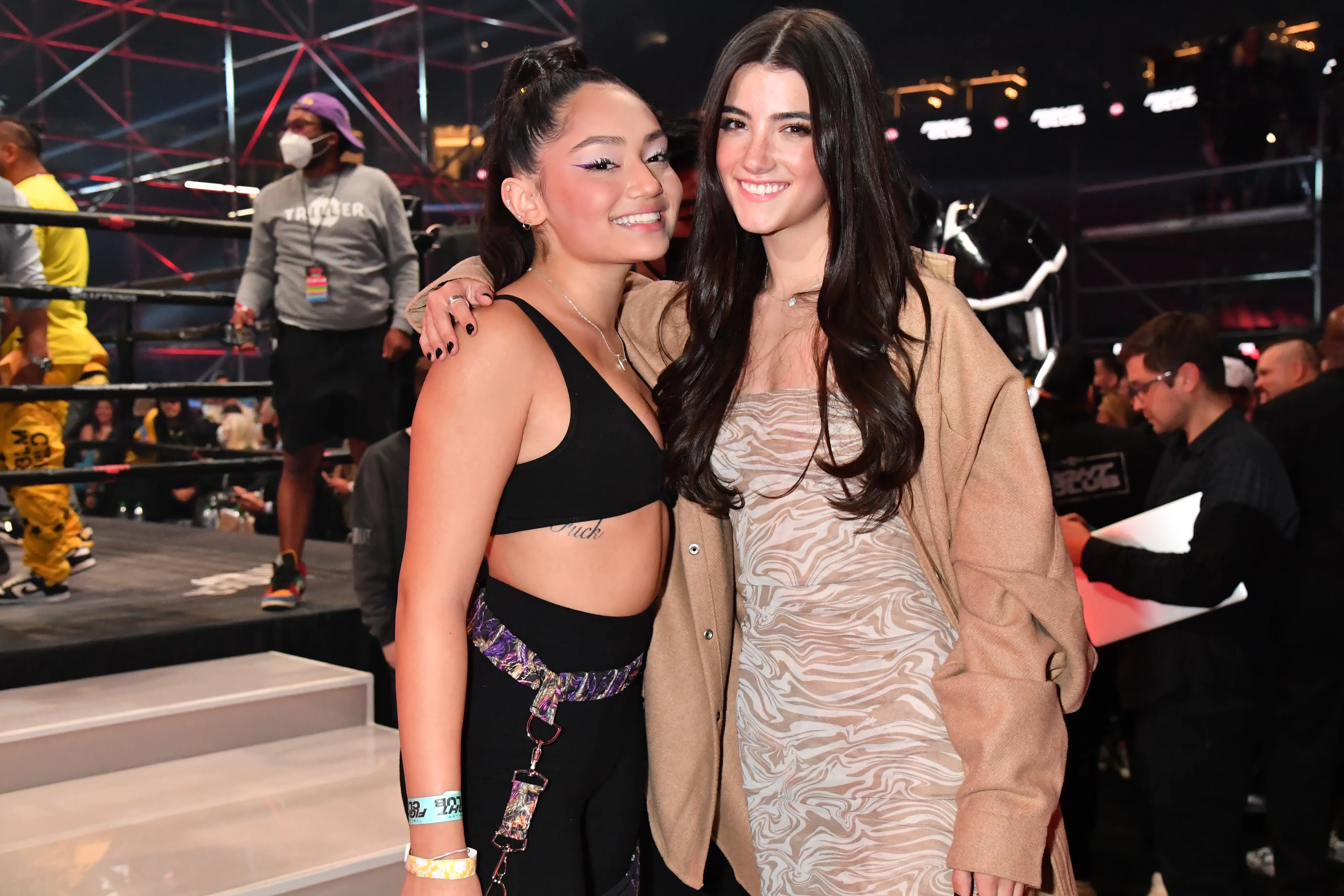 Influencers Avani Gregg and Charli D'Amelio appeared at a Triller-hosted fight between Jake Paul and Ben Askren in April 2021.