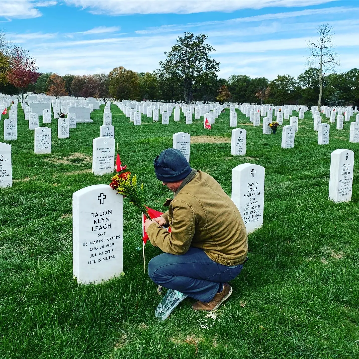 Jones standing next to Talon Leach's grave.