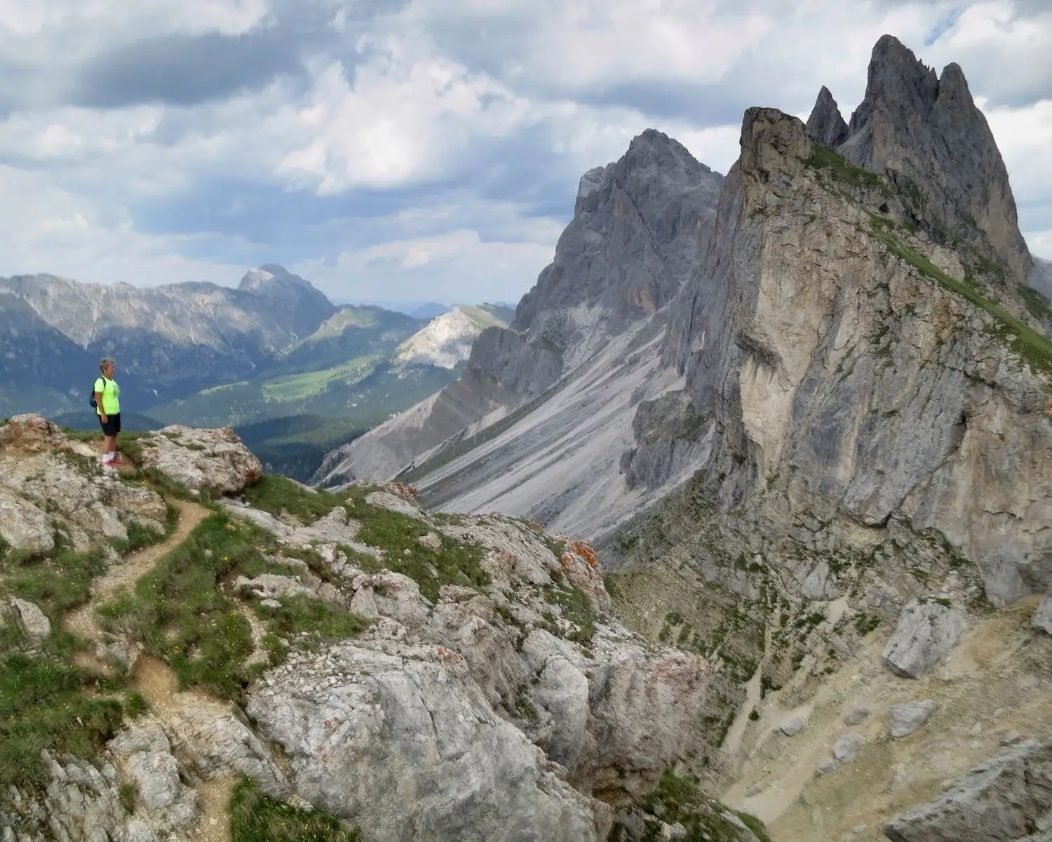 The author poses while on a trek through the Silvery Dolomites.