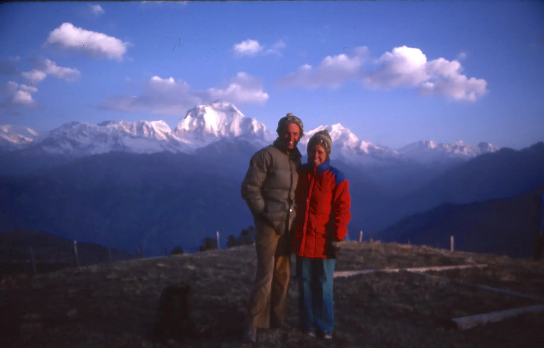 The author and a companion pose atop Poon Hill near Gorompani, Nepal.