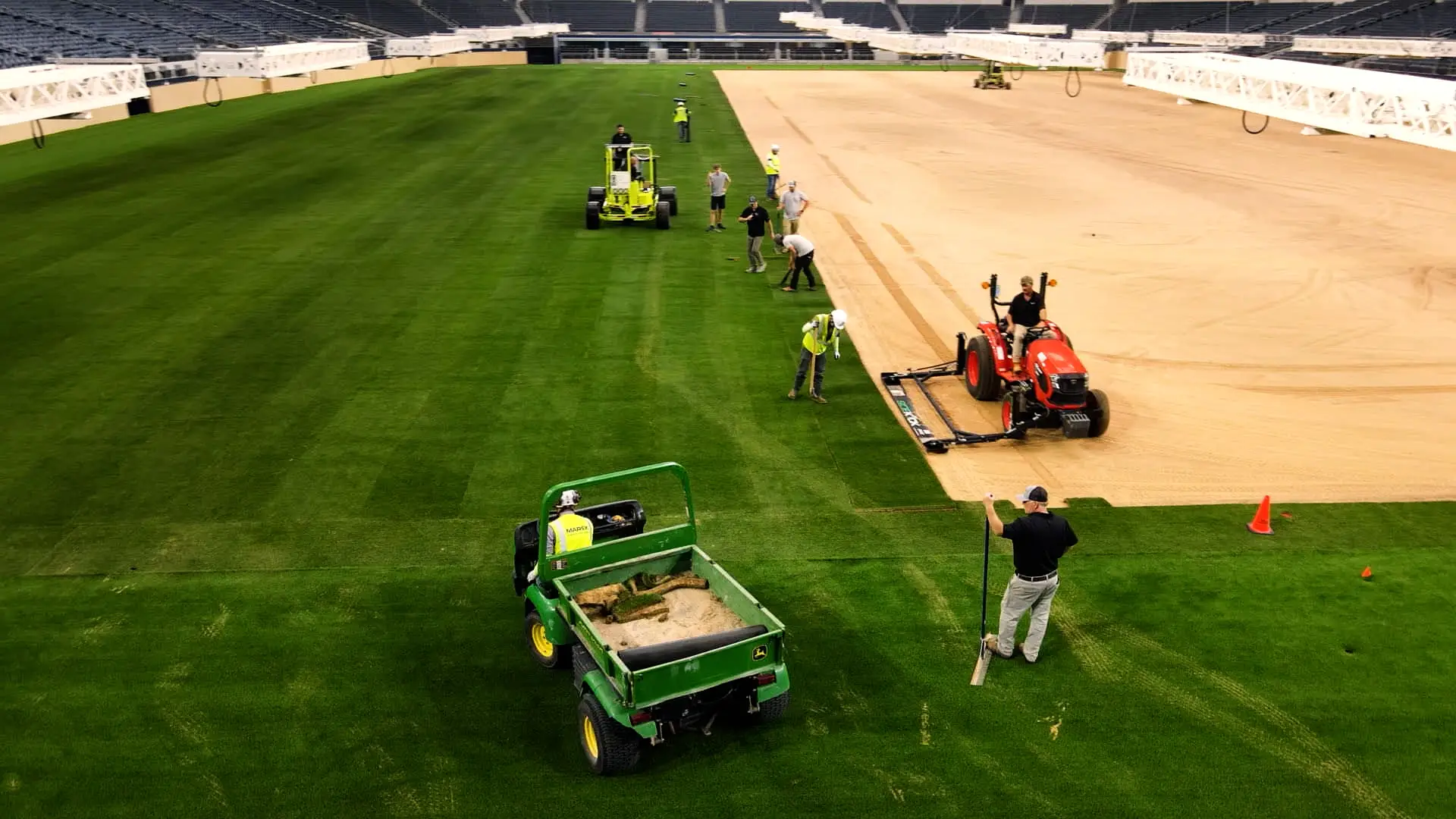 Sod being put down in a World Cup stadium.