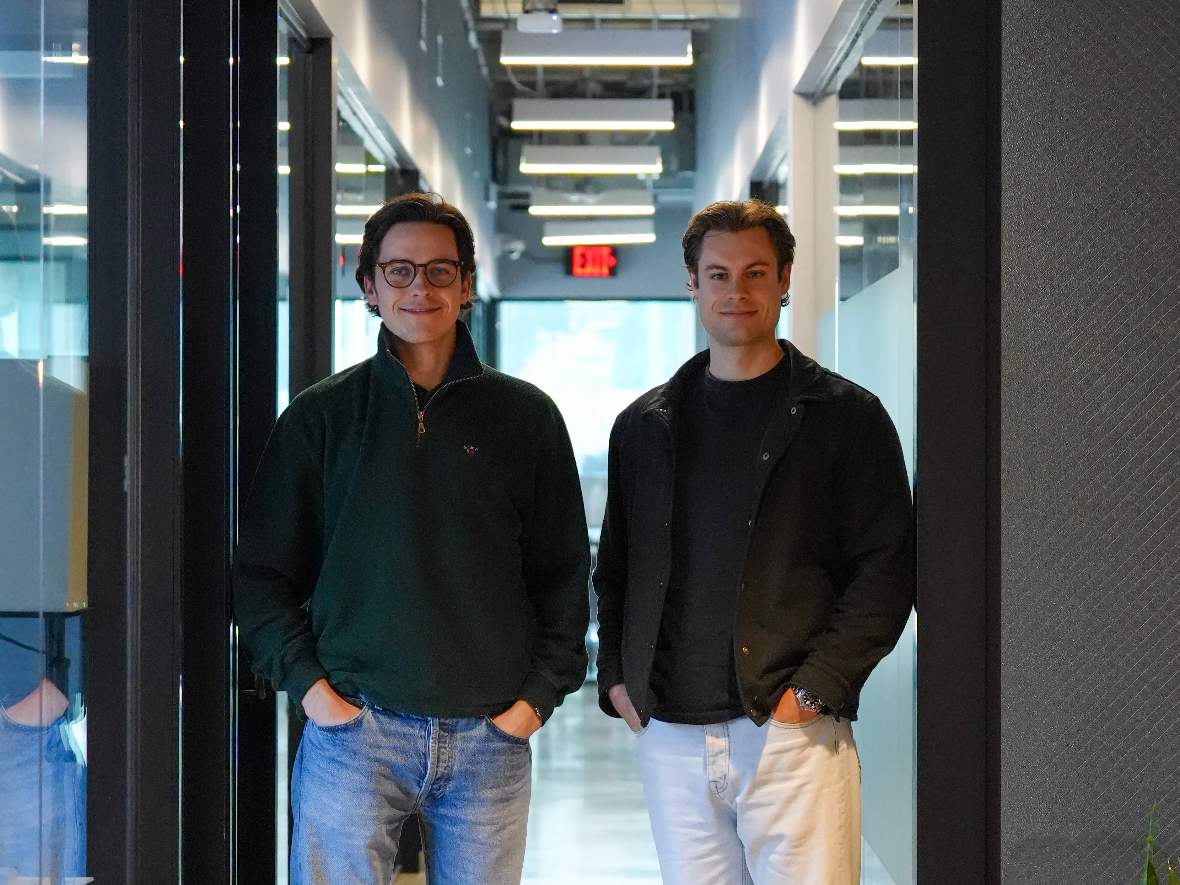 Patrice Becker and Leonhard Soenke standing in office