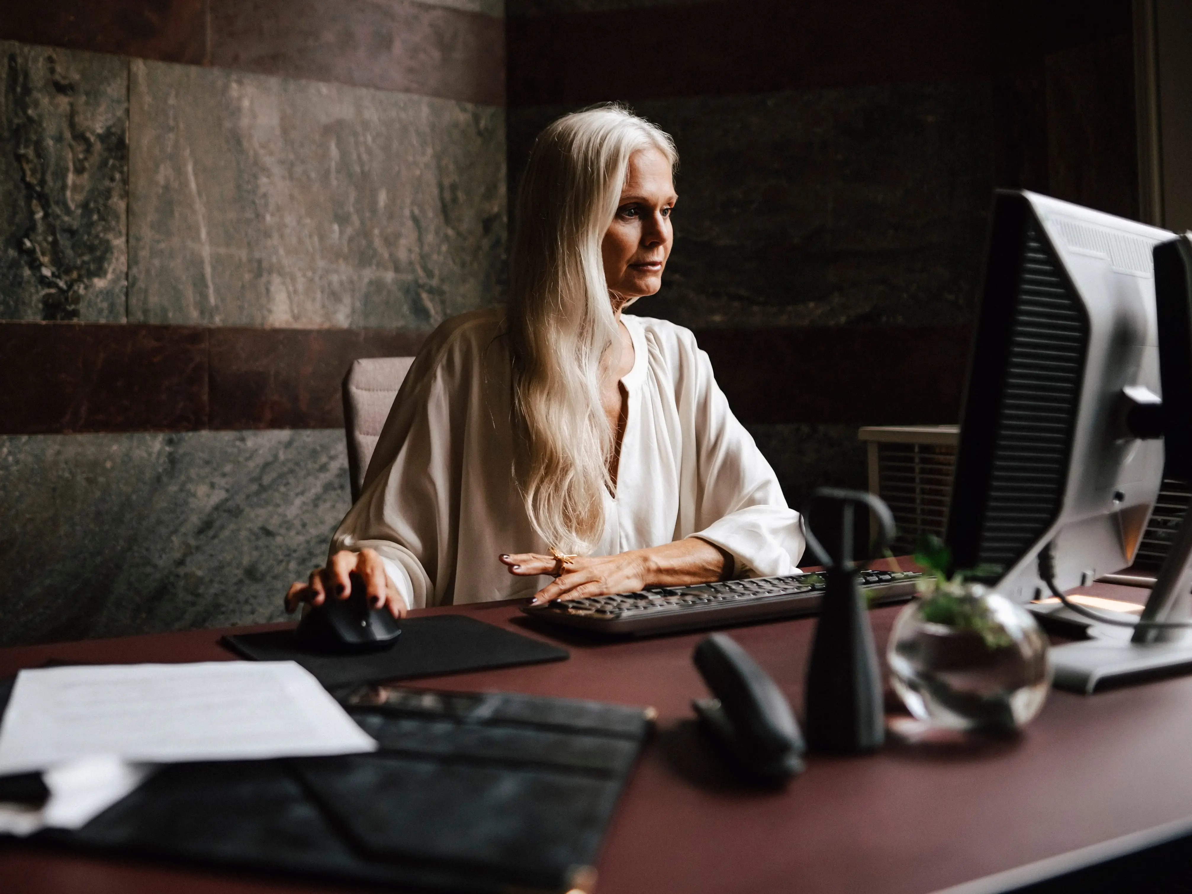 A woman working at her desk