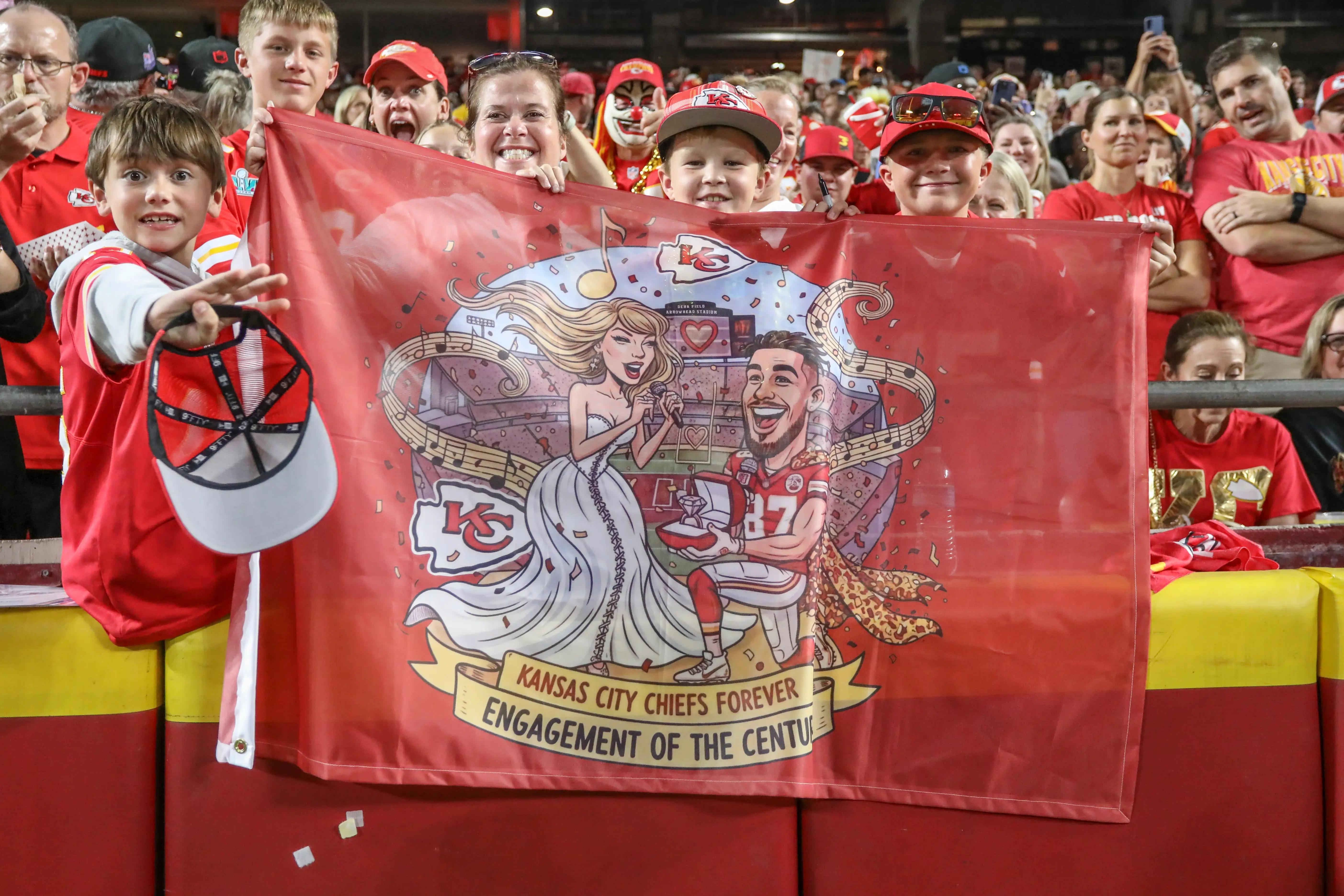 Kansas City Chiefs fans celebrate the engagement of Taylor Swift and Travis Kelce.
