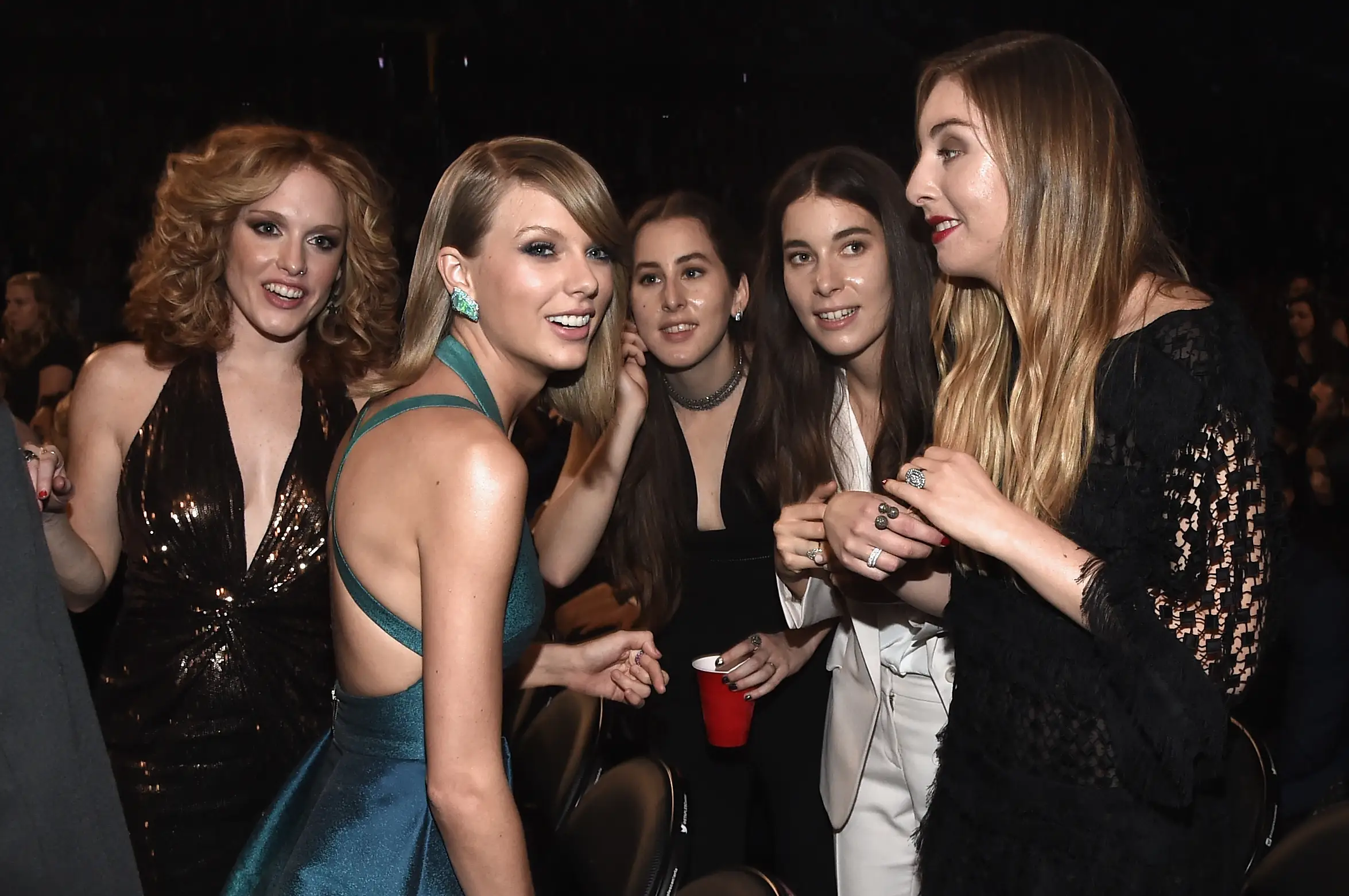 Abigail Anderson and Taylor Swift and Haim sisters