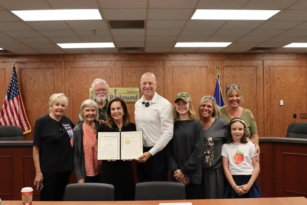 Ray Stier received an American flag and a copy of the Congressional Record from McClain on Thursday as a commendation of his work.