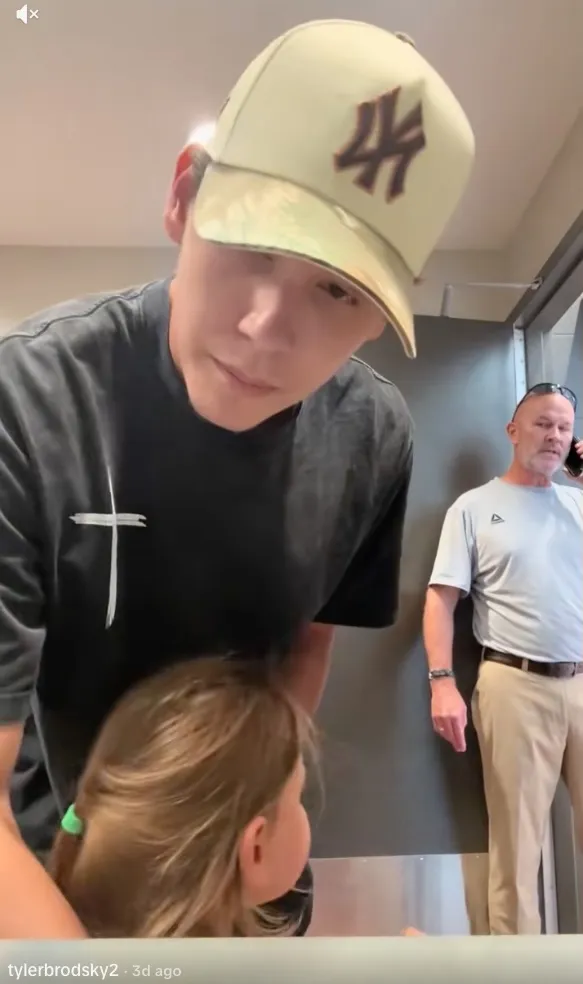 Tyler Brodsky (left) is with his two young girls in a women's restroom.