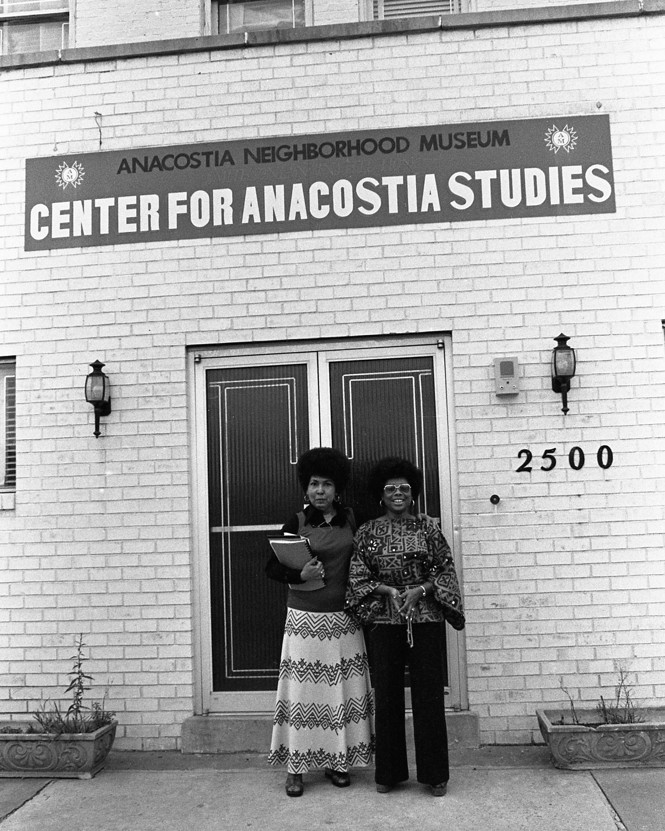 American historian Louise Daniel Hutchinson and an unidentified staff member stand outside the Center for Anacostia Studies
