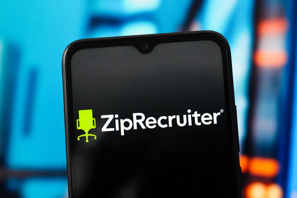 In this photo illustration, the ZipRecruiter (Zip Recruiter) logo is seen displayed on a smartphone screen