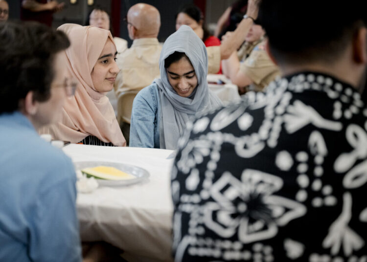 Over shared meals, Philadelphians write a recipe for citizenship