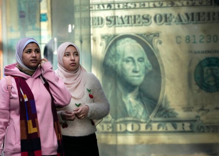 Dollar hits 13-month high as foreign investors overlook worries about Trump