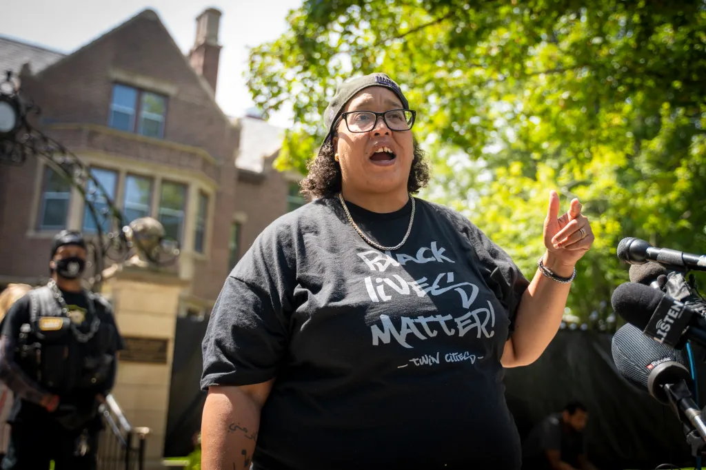 Black Lives Matter Twin Cities leader Chauntyll Allen speaks during a protest outside the Governor's mansion in St. Paul, Minn. on Aug. 1, 2023.