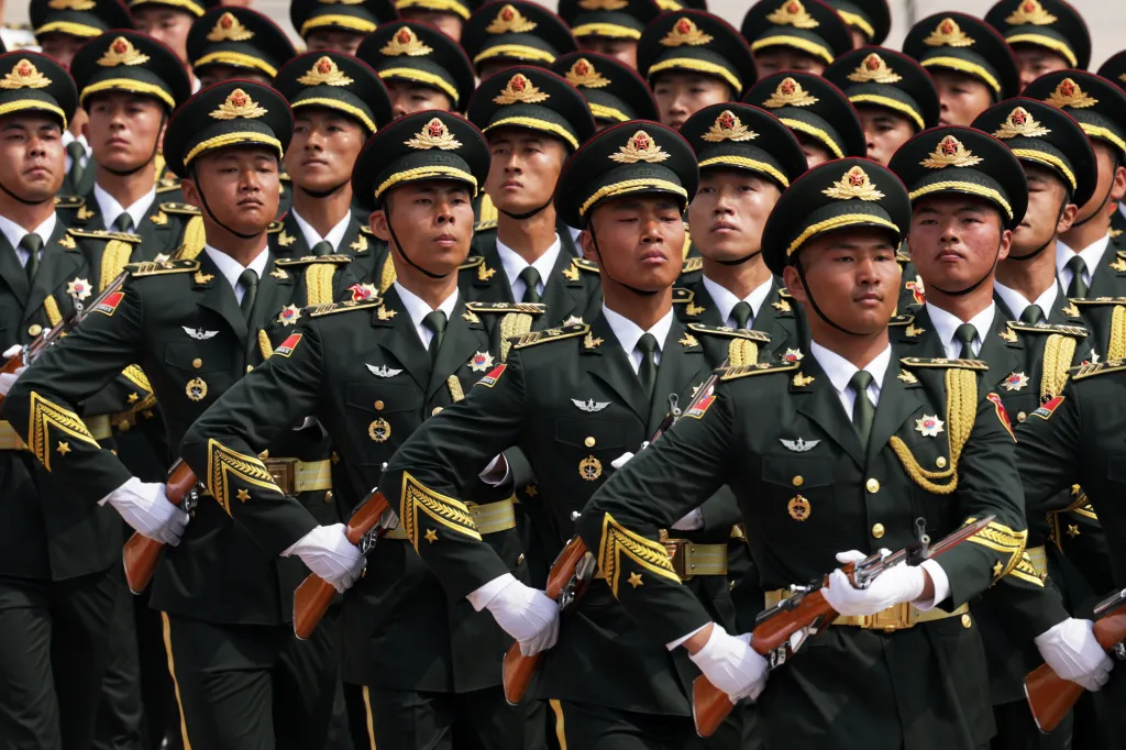 The Chinese People's Liberation Army honor guard marches past during a welcome ceremony for U.S. President Donald Trump at the Great Hall of the People on May 14, 2026 in Beijing, China.