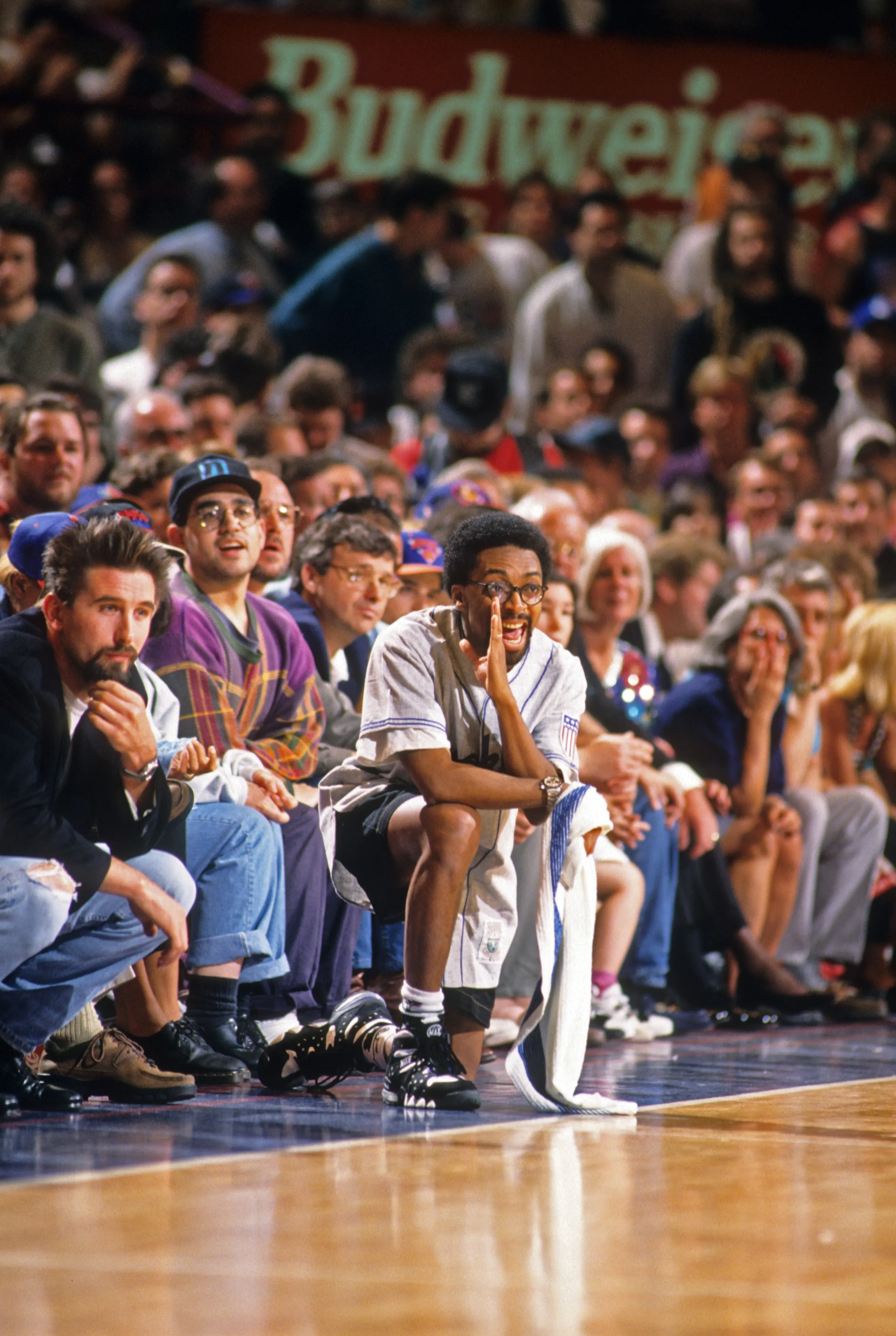 Celebrity film director and New York Knicks fan Spike Lee seated courtside during Game 7 vs Chicago Bulls at Madison Square Garden.