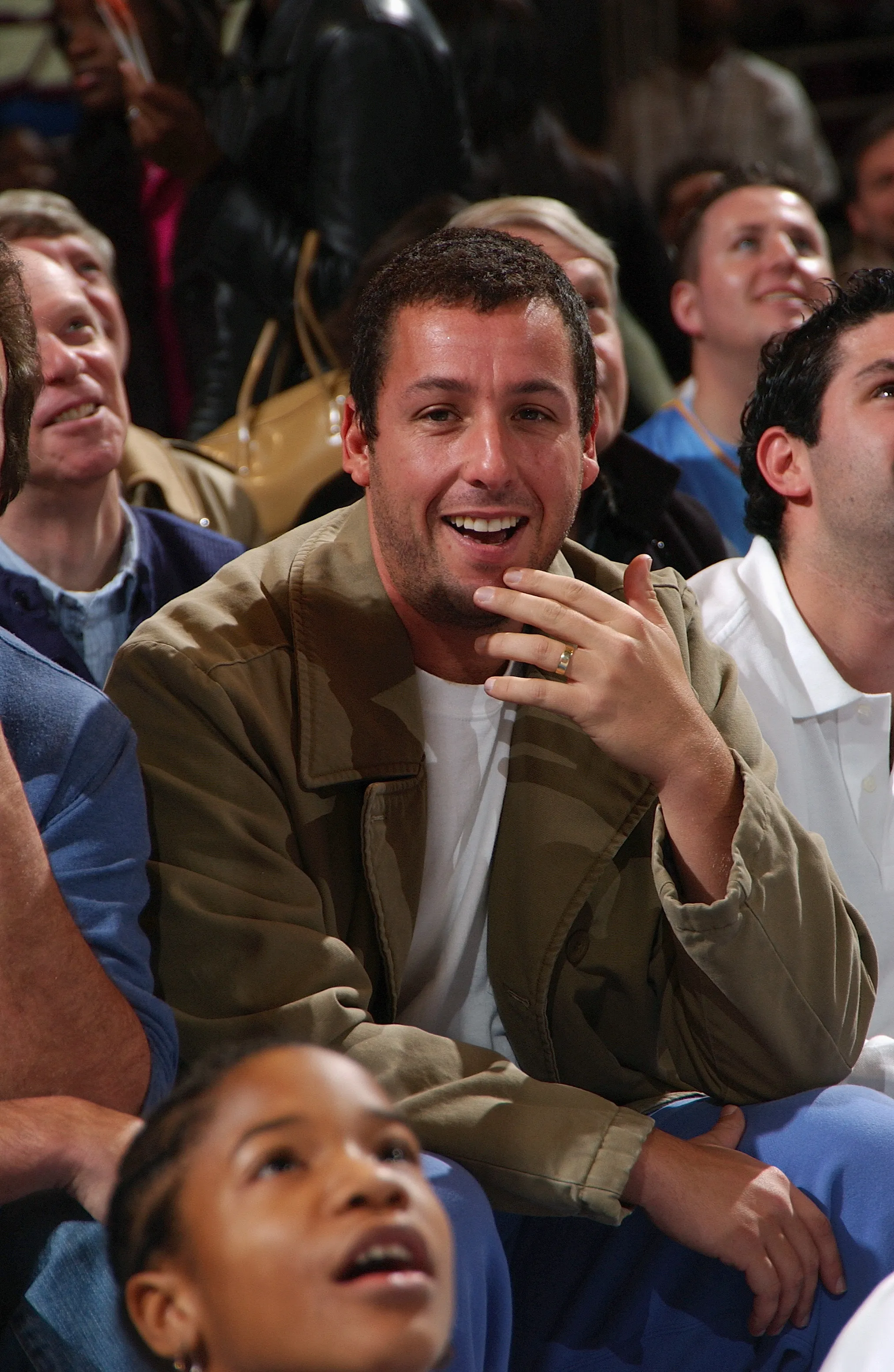 Adam Sandler watches the game between the Denver Nuggets and the New York Knicks at Madison Square Garden on December 12, 2004 in New York