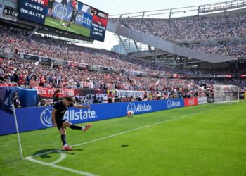 How Can Soccer Players Bend Their Shots in Midair?