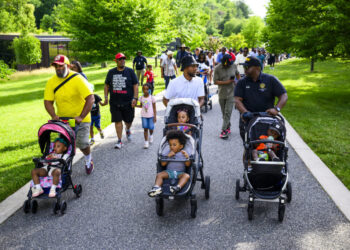 These stroller-pushing fathers came together for a walk. They left with more.