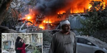 Russian attack on Ukraine kills at least 11 and traps others in damaged buildings