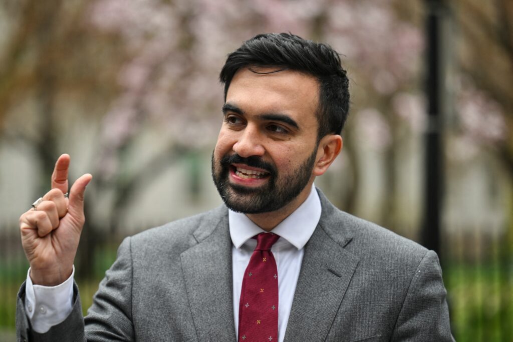 Democratic socialists are winning key races in cities. What that label means.