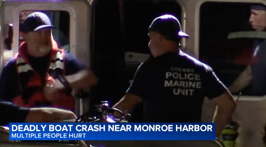 Members of the Chicago Police Marine Unit on a boat after a deadly boat crash.