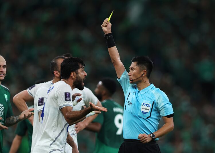 Shut out of the World Cup again, China roots for a referee