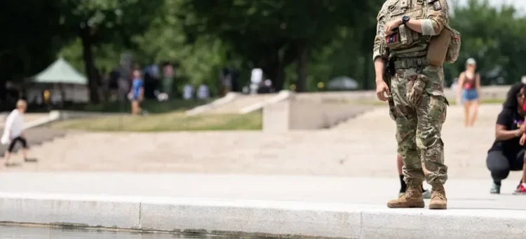 Woman swarmed by National Guard and US Marshals for dipping hand into reflecting pool: TMZ