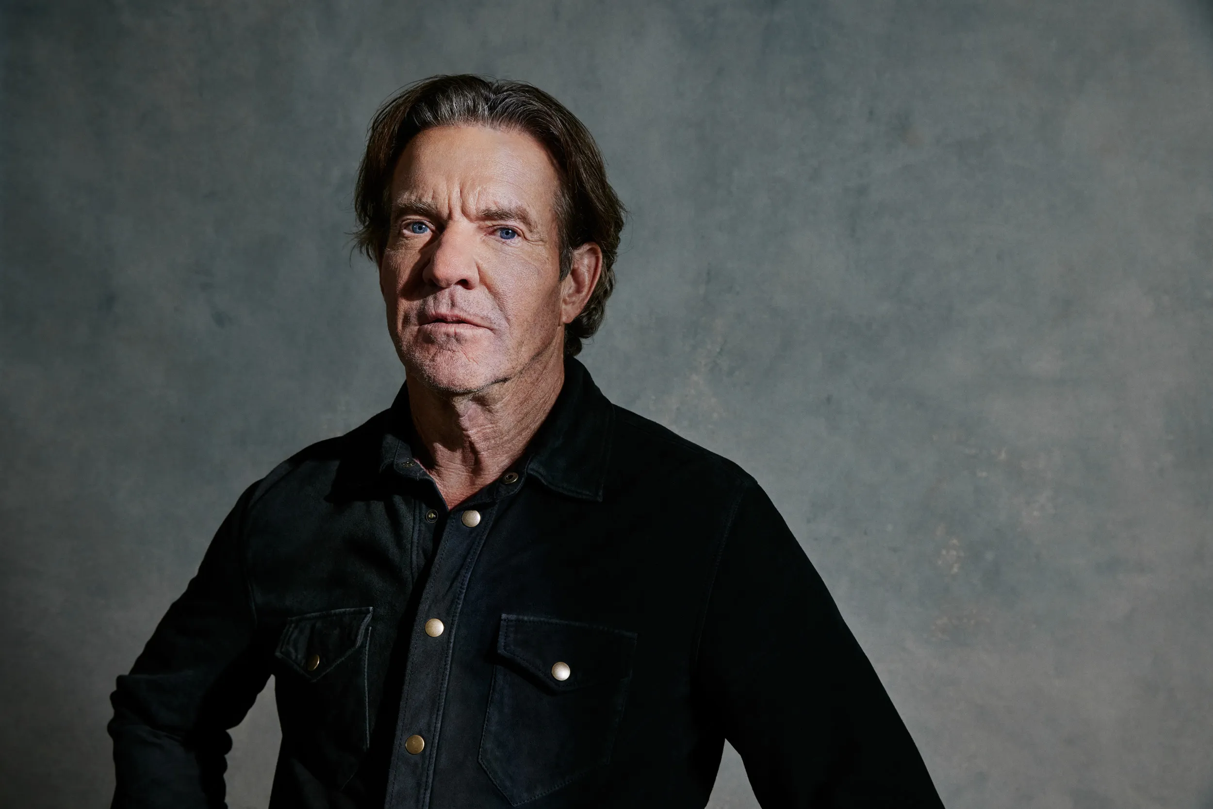 Actor Dennis Quaid posing for a portrait.