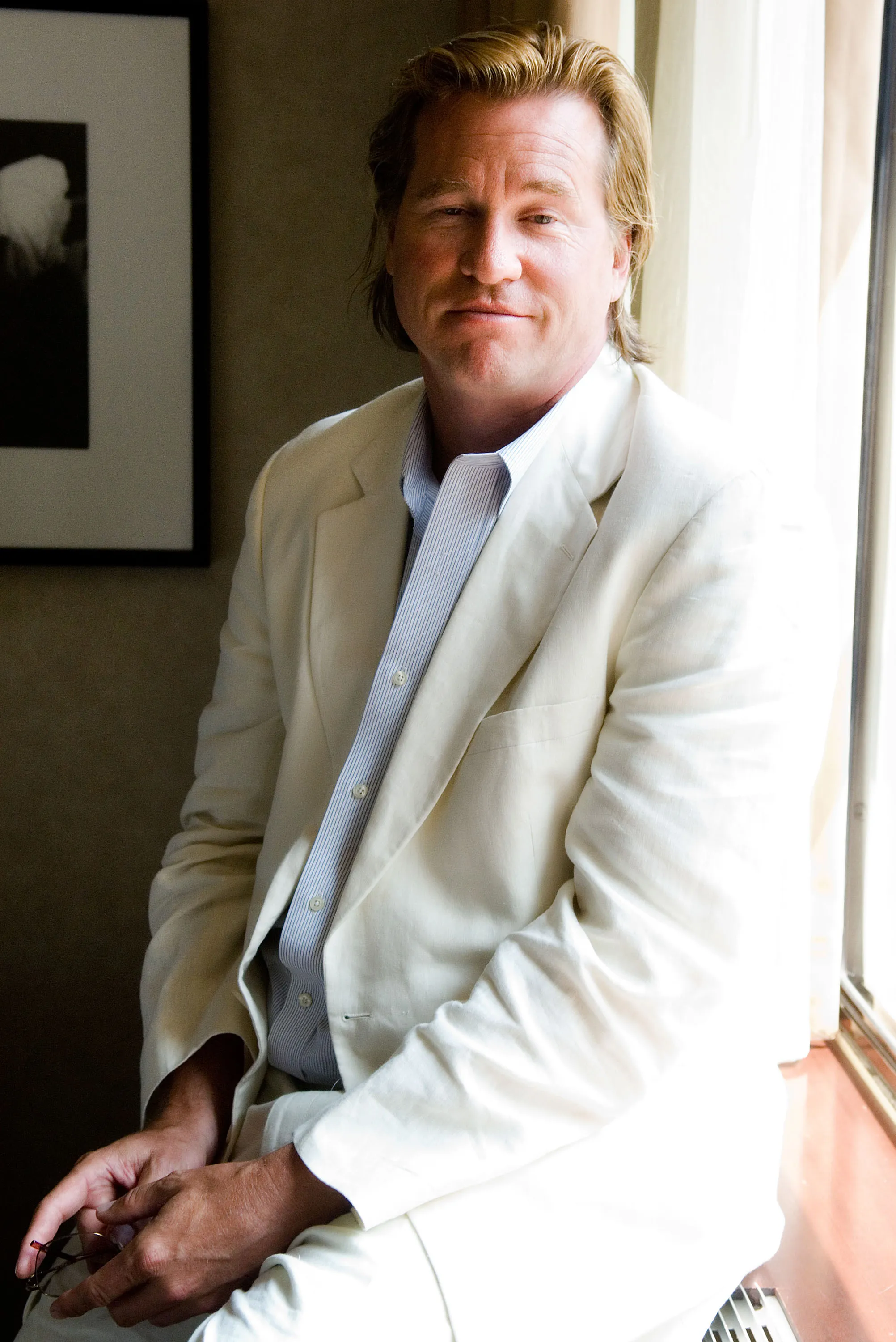Val Kilmer posing at the