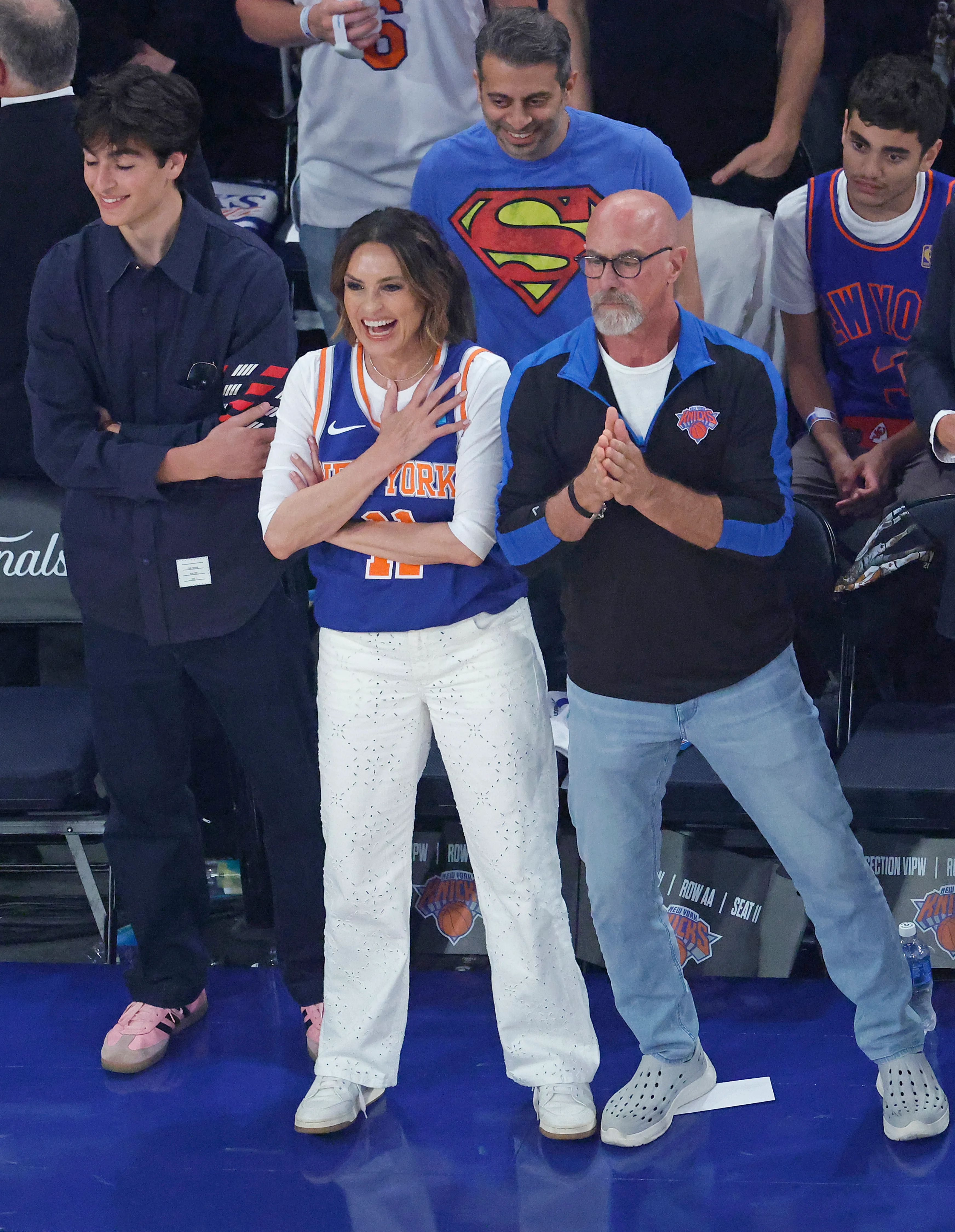 Mariska Hargitay smiles court-side before a Knicks game.