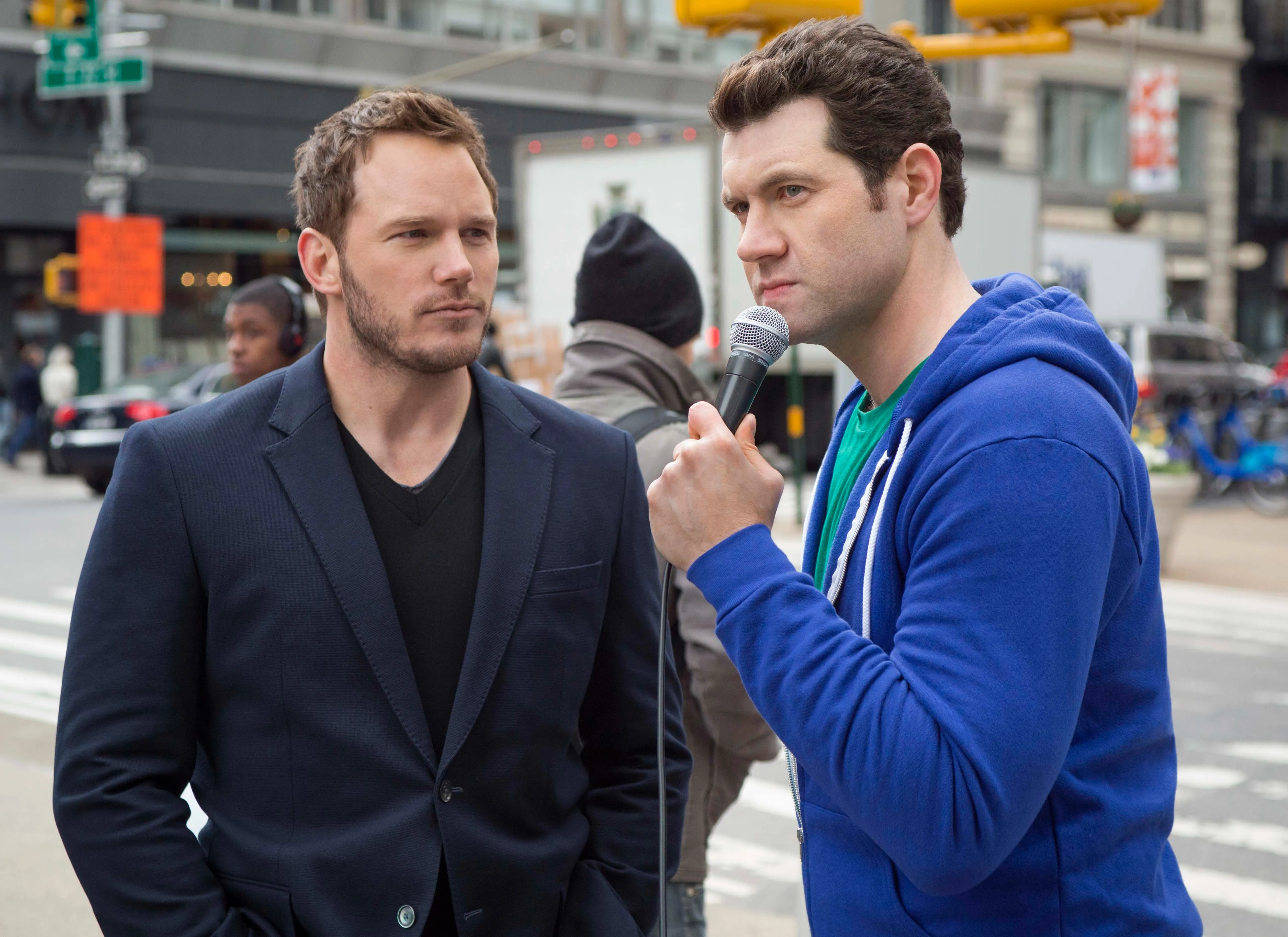 Billy Eichner holding a microphone and interviewing Chris Pratt on 