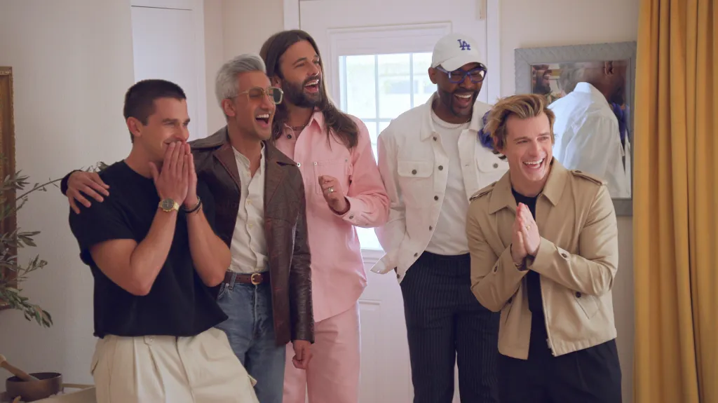 From left, Antoni Porowski, Tan France, Jonathan Van Ness, Karamo Brown, and Jeremiah Brent smiling and laughing.