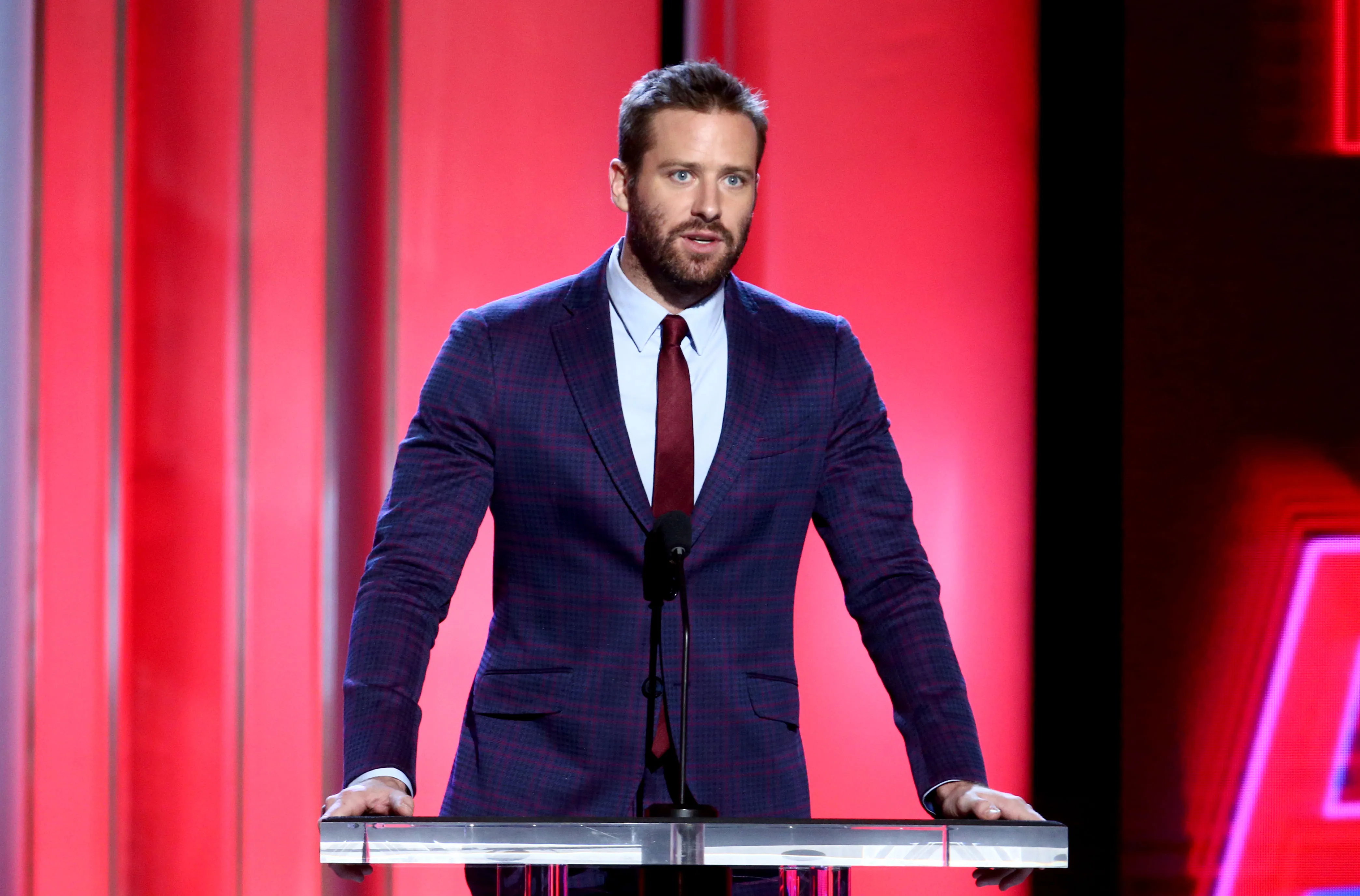 Armie Hammer speaks at the 2019 Film Independent Spirit Awards on Feb. 23, 2019.